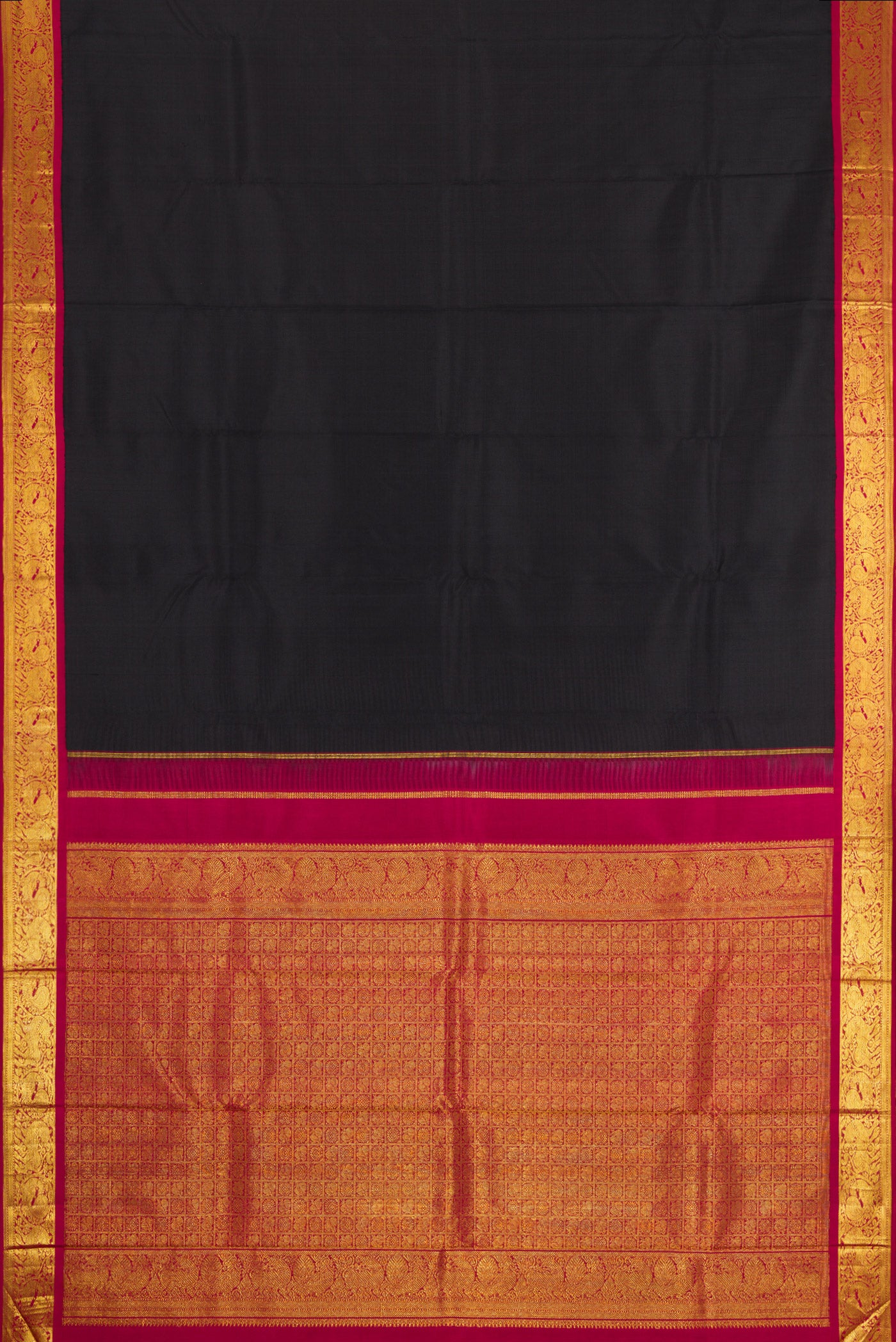 Flat view of Black Kanjivaram Silk Saree with Plain Body and Zari Border. 