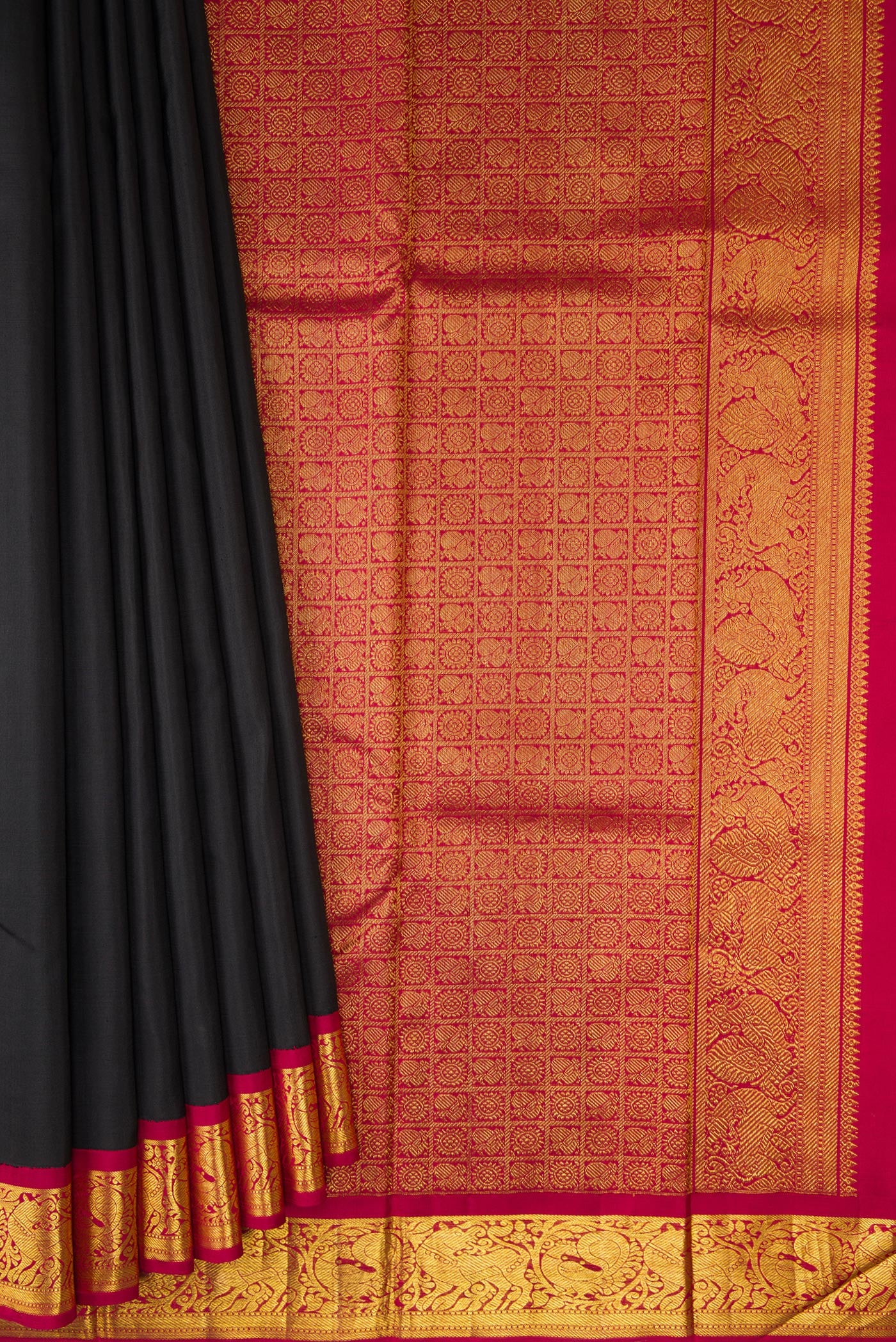 Pleats and pallu of Black Kanjivaram Silk Saree with Plain Body and Zari Border. 