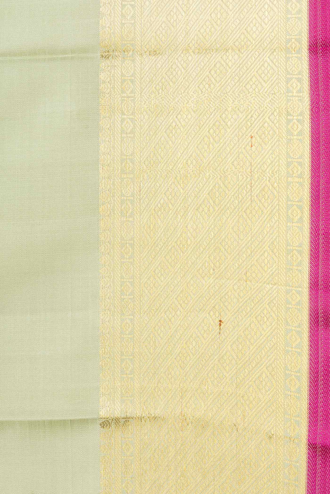 Border image of Pista Green Dual Tone Kanchipuram Silk Saree with Zari And Thread Butta on the body and Zari Border. 