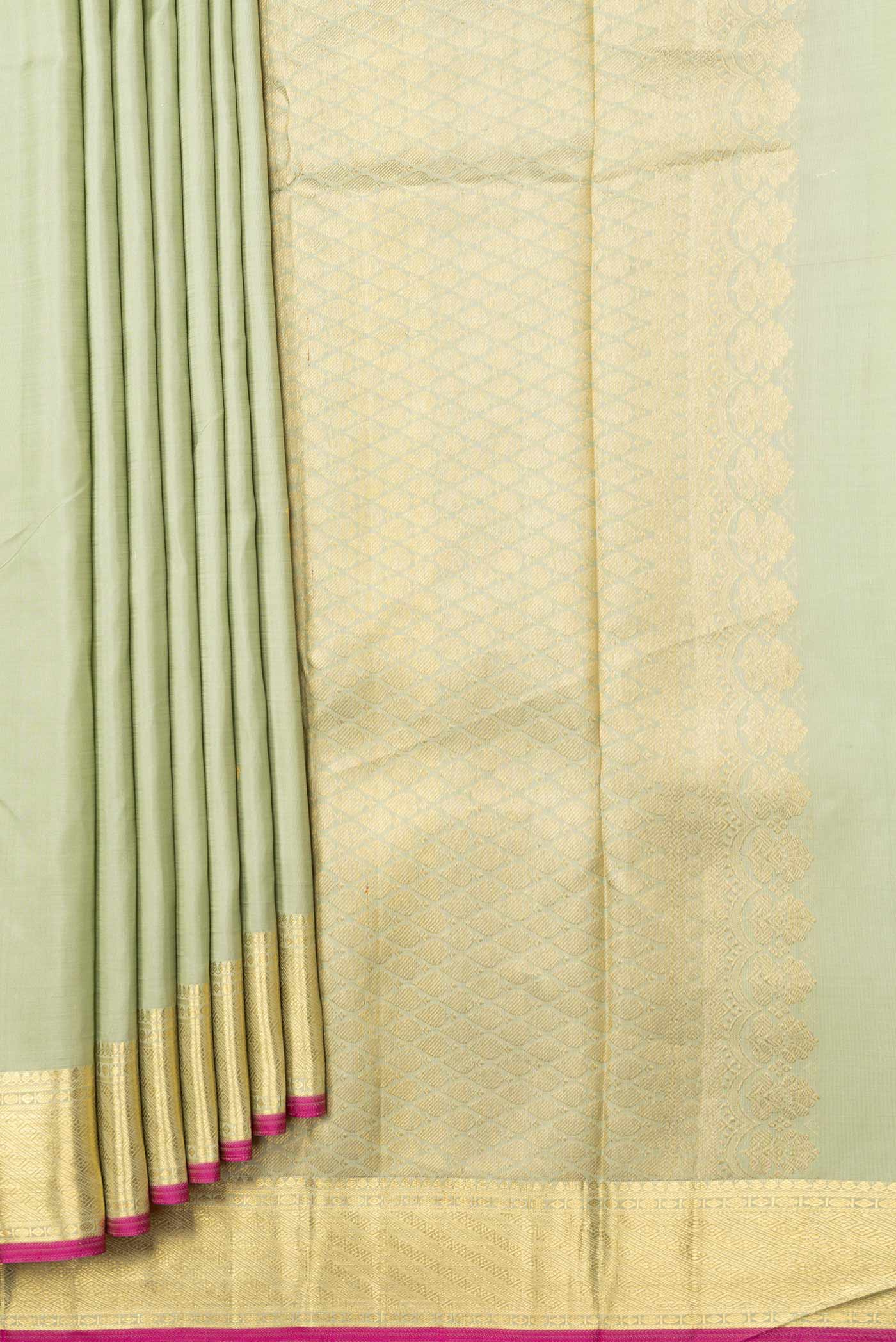 Pleats and pallu of Pista Green Dual Tone Kanchipuram Silk Saree with Zari And Thread Butta on the body and Zari Border. 