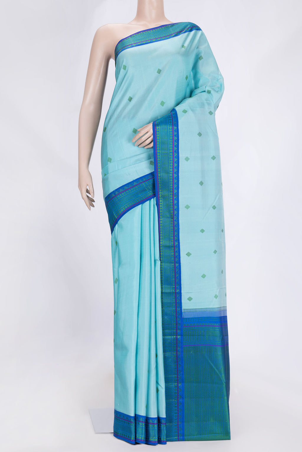 Sky Blue Dual Tone Kanjivaram Saree with Thread Butta on the body and Thread Border.  displayed on a mannequin