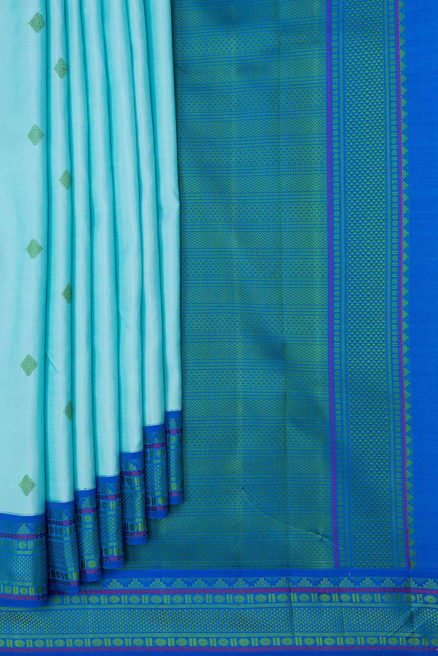 Pleats and pallu of Sky Blue Dual Tone Kanjivaram Saree with Thread Butta on the body and Thread Border. 