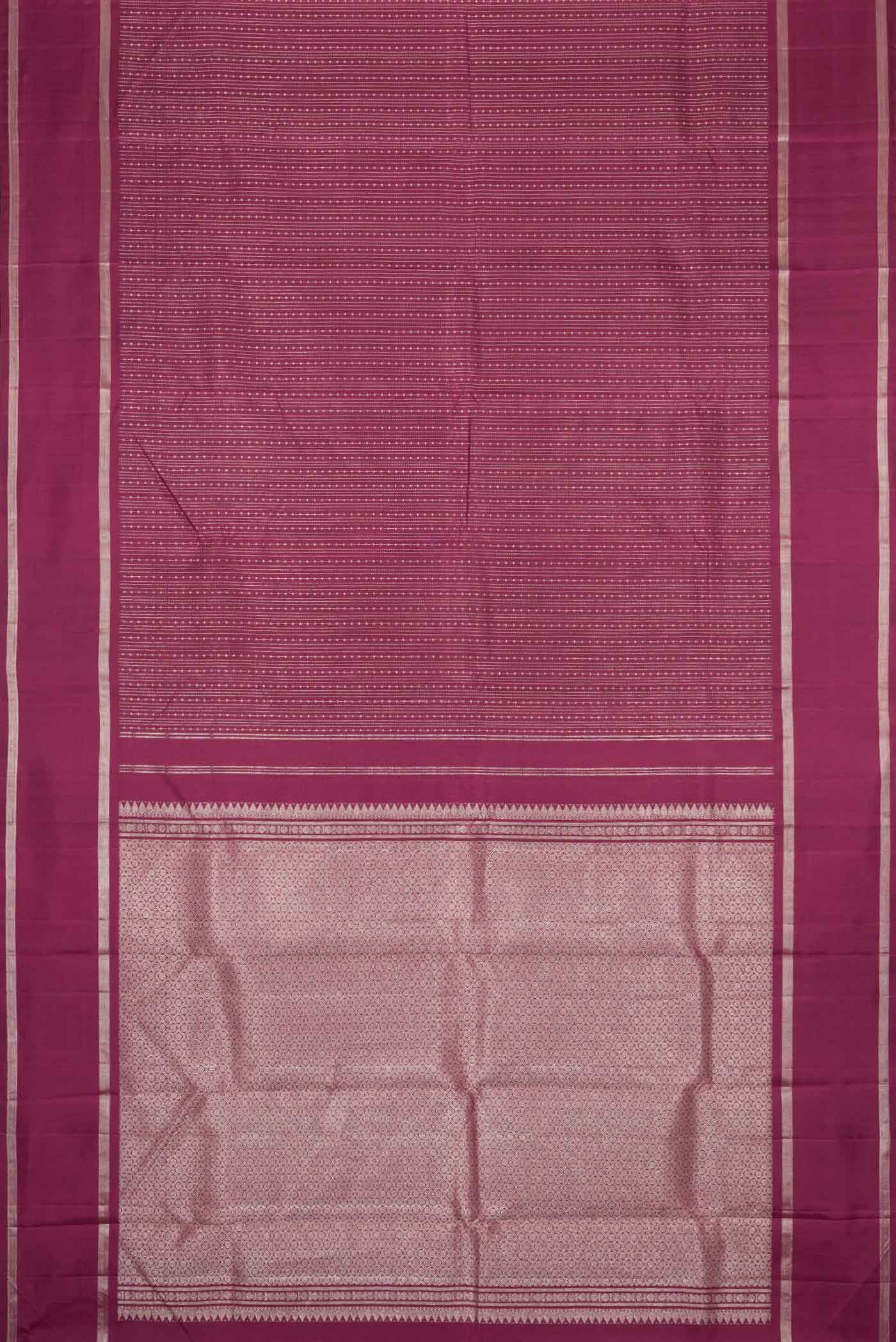 Flat view of Maroon Dual Tone Kanchipuram Silk Saree with Stripes on the body and Zari Border