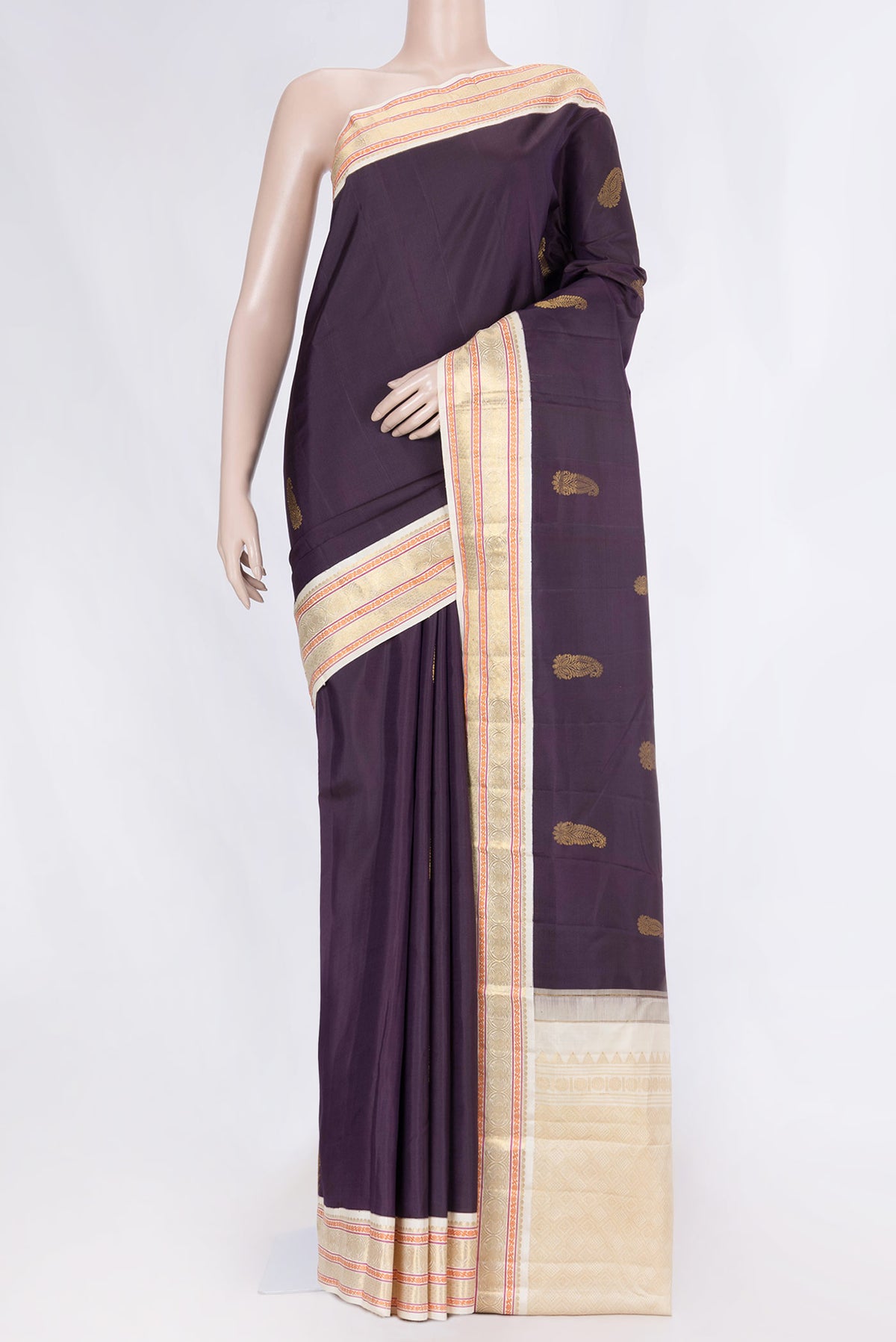 Burgundy Dual Tone Kanchipuram Silk Saree with Zari Butta on the body and Zari Border displayed on a mannequin