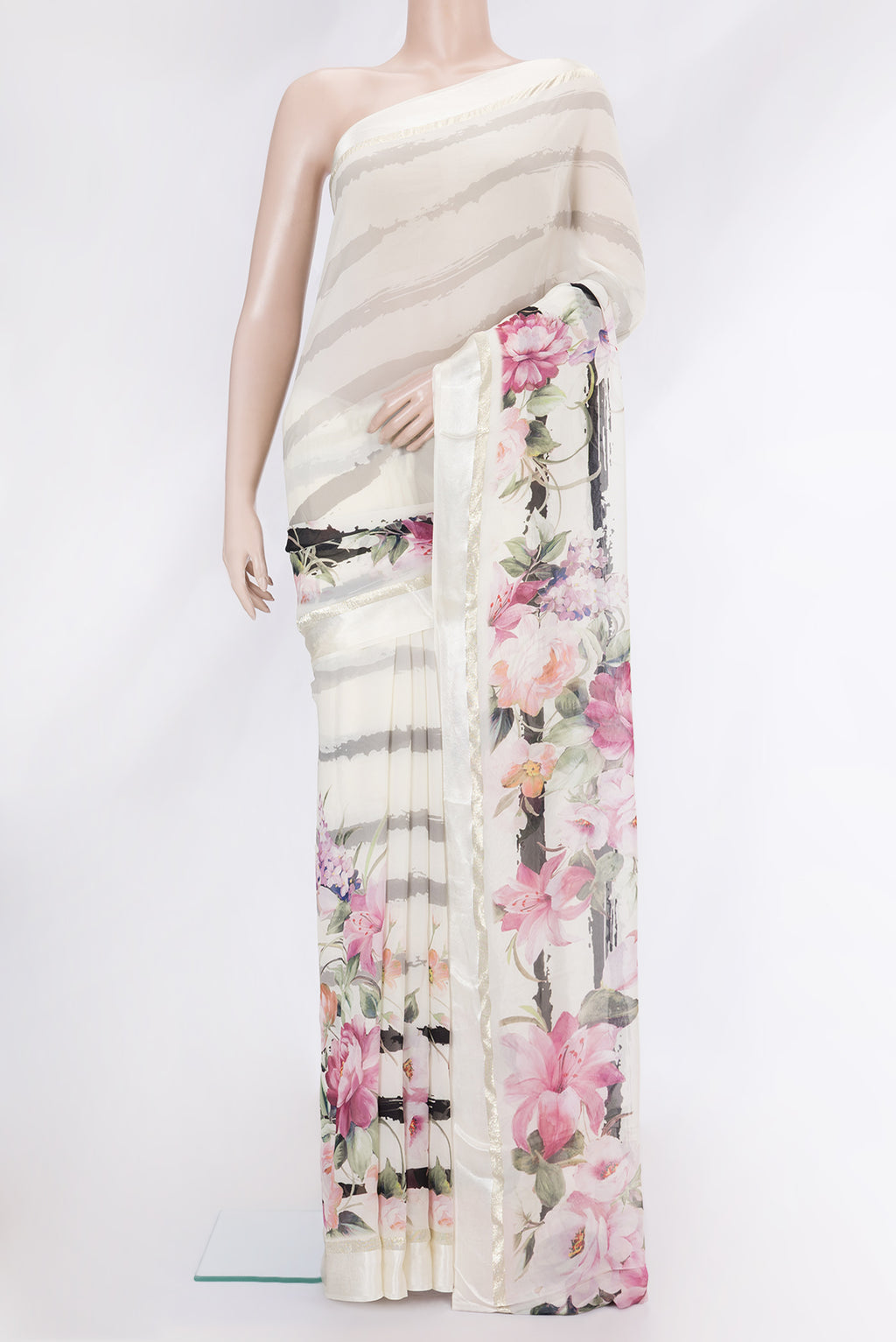 Beige Dual Tone Mysore Crepe Saree with Printed design on the body and Printed Border.  displayed on a mannequin