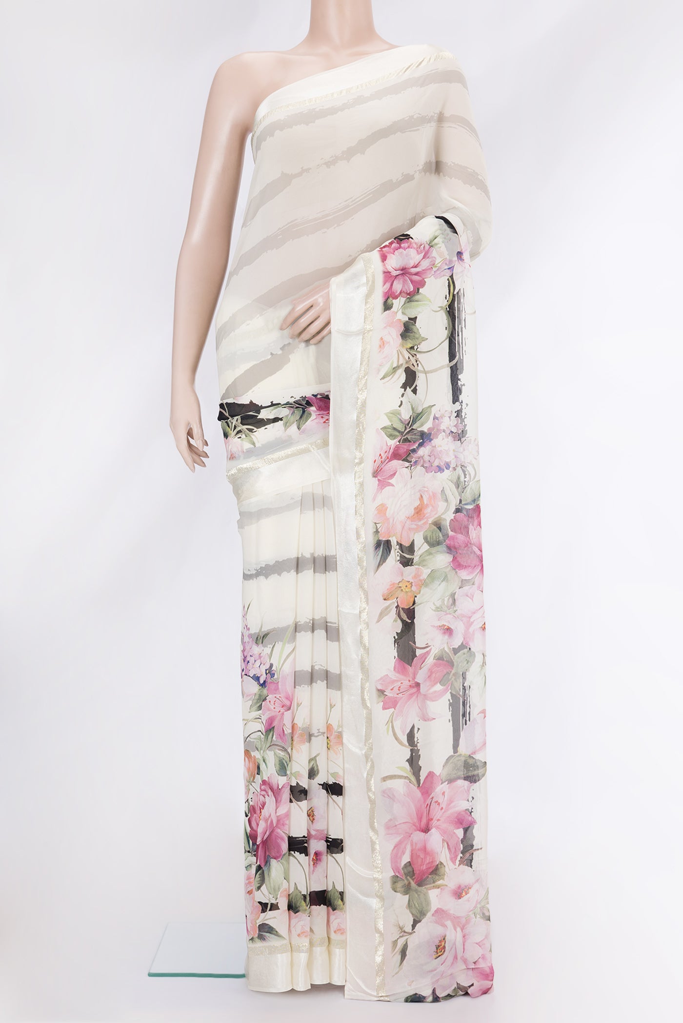 Beige Dual Tone Mysore Crepe Saree with Printed design on the body and Printed Border.  displayed on a mannequin