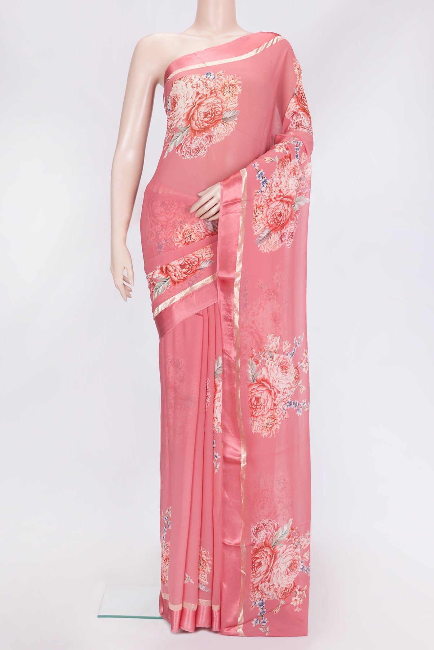 Pink Dual Tone Georgette Saree with Printed design on the body and Zari Border.  displayed on a mannequin