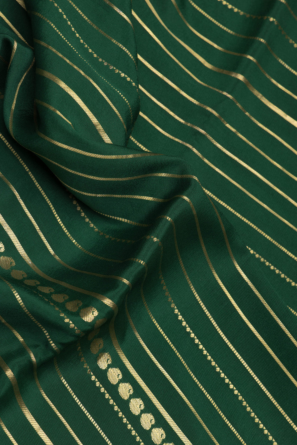 Close up of Bottle Green Dual Tone Mysore Silk Saree with Stripes on the body and Zari Border.  displaying folds