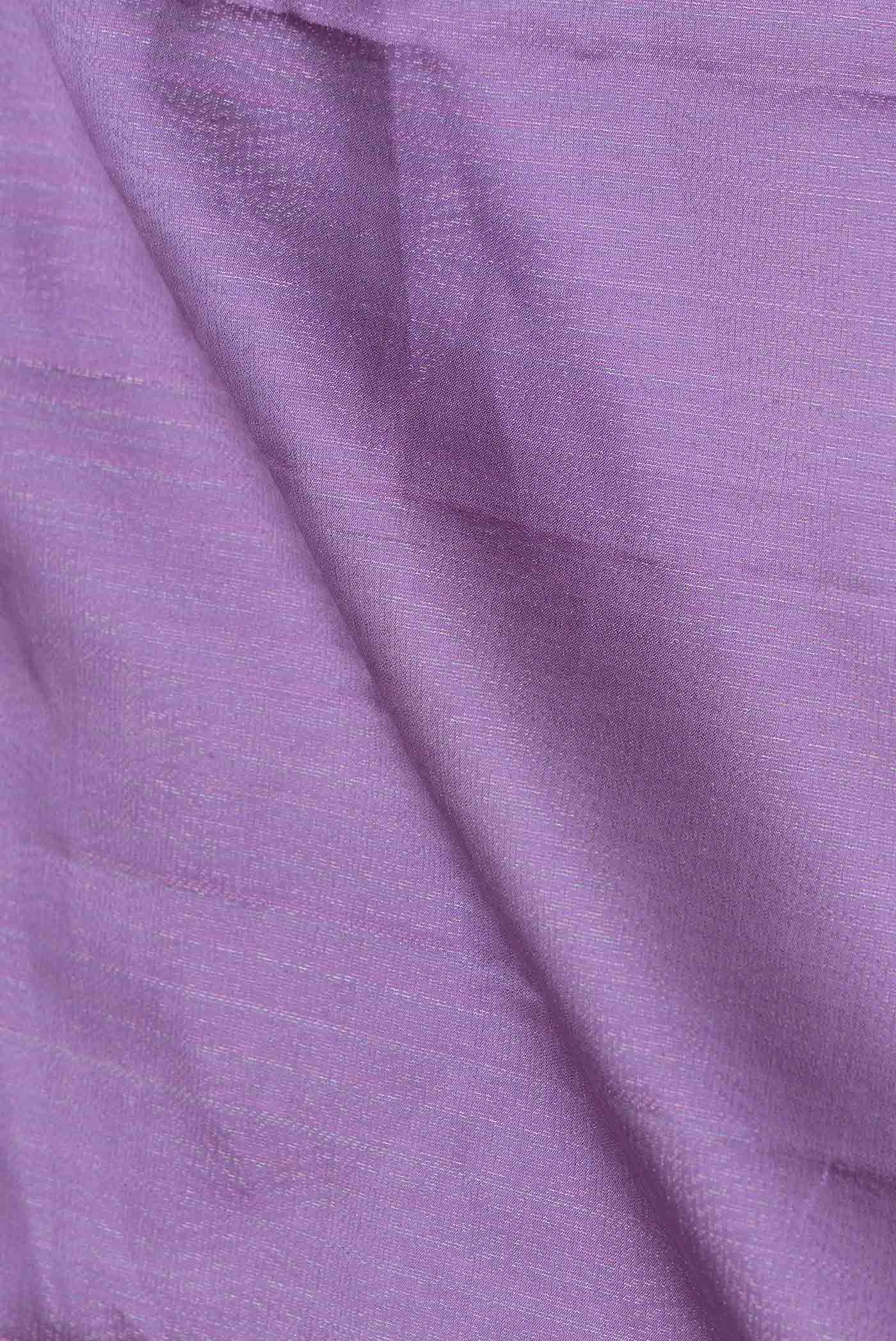 Close up of Lavender Dual Tone Soft Silk Saree with Zari Brocade on the body and Zari Border.  displaying folds