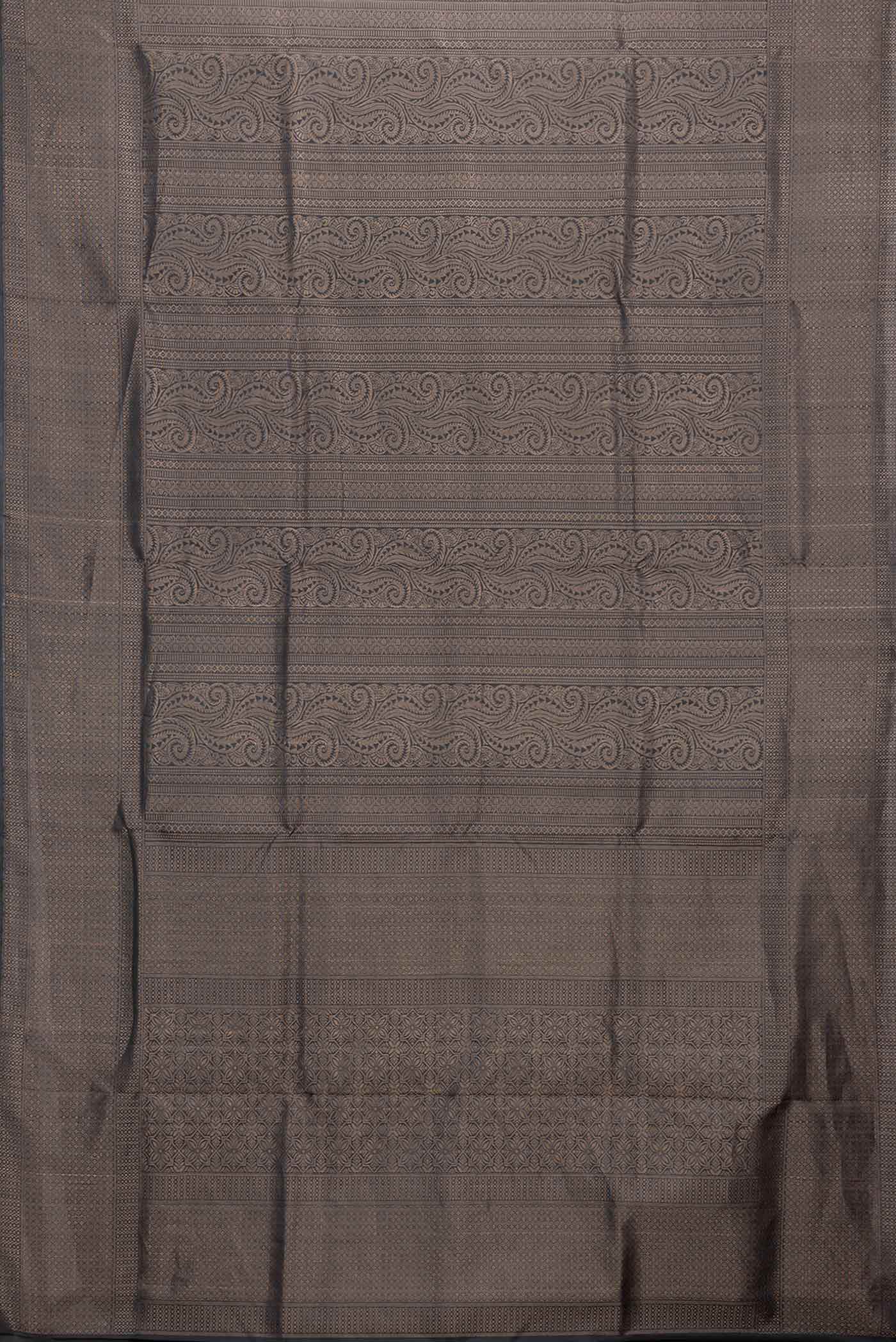 Flat view of Black Dual Tone Soft Silk Saree with Zari Brocade on the body and Zari Border. 
