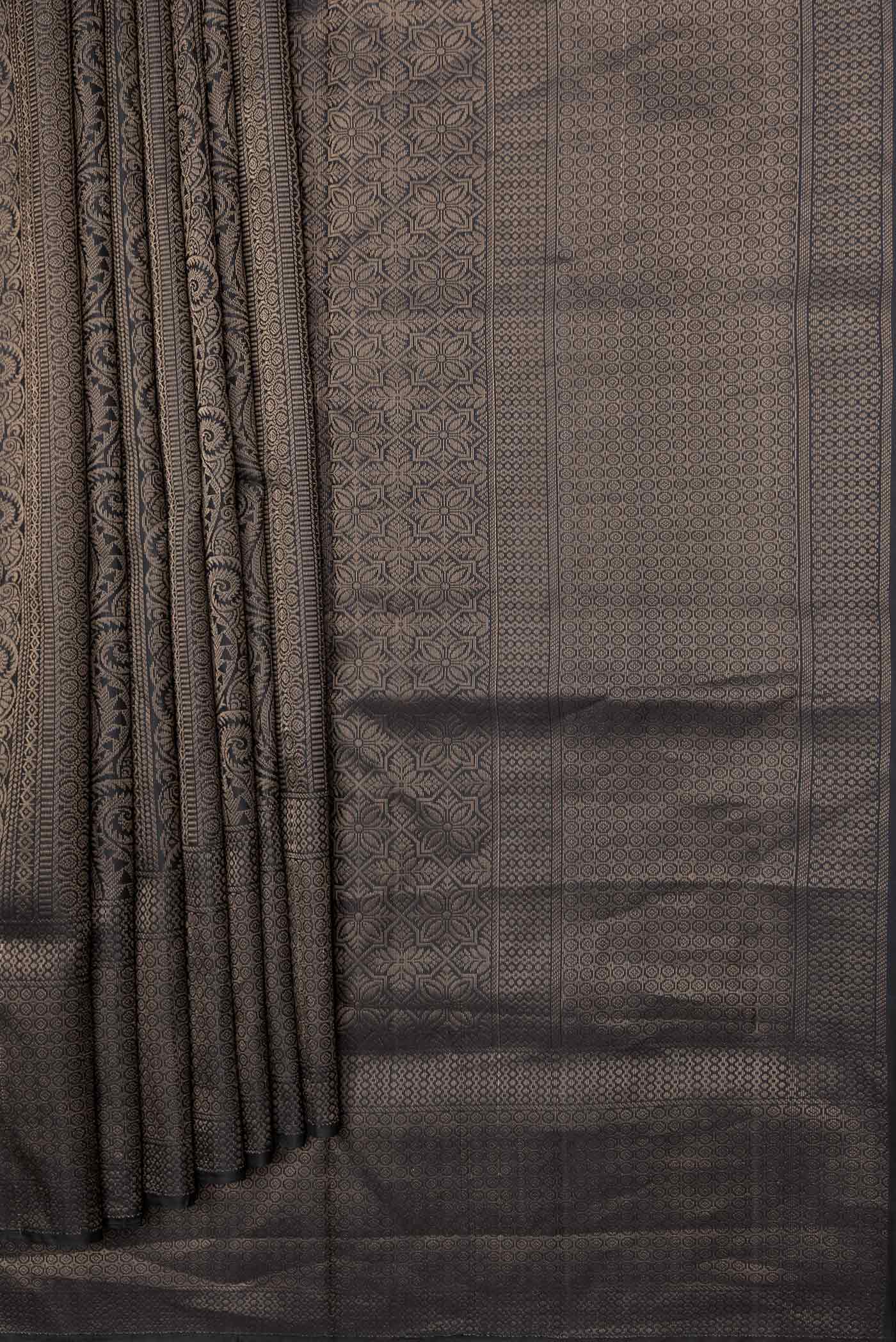 Pleats and pallu of Black Dual Tone Soft Silk Saree with Zari Brocade on the body and Zari Border. 