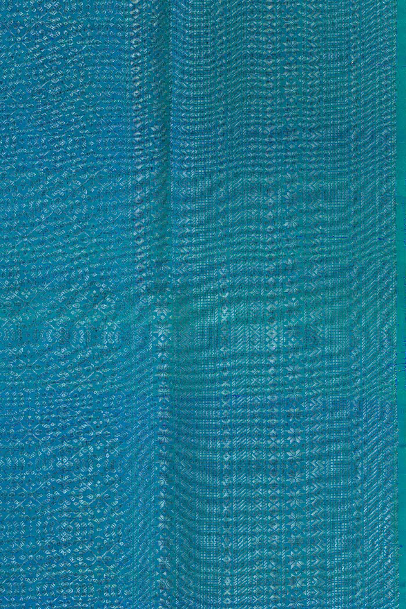 Border image of Peacock Blue Dual Tone Soft Silk Saree with Zari Brocade on the body and Zari Border. 