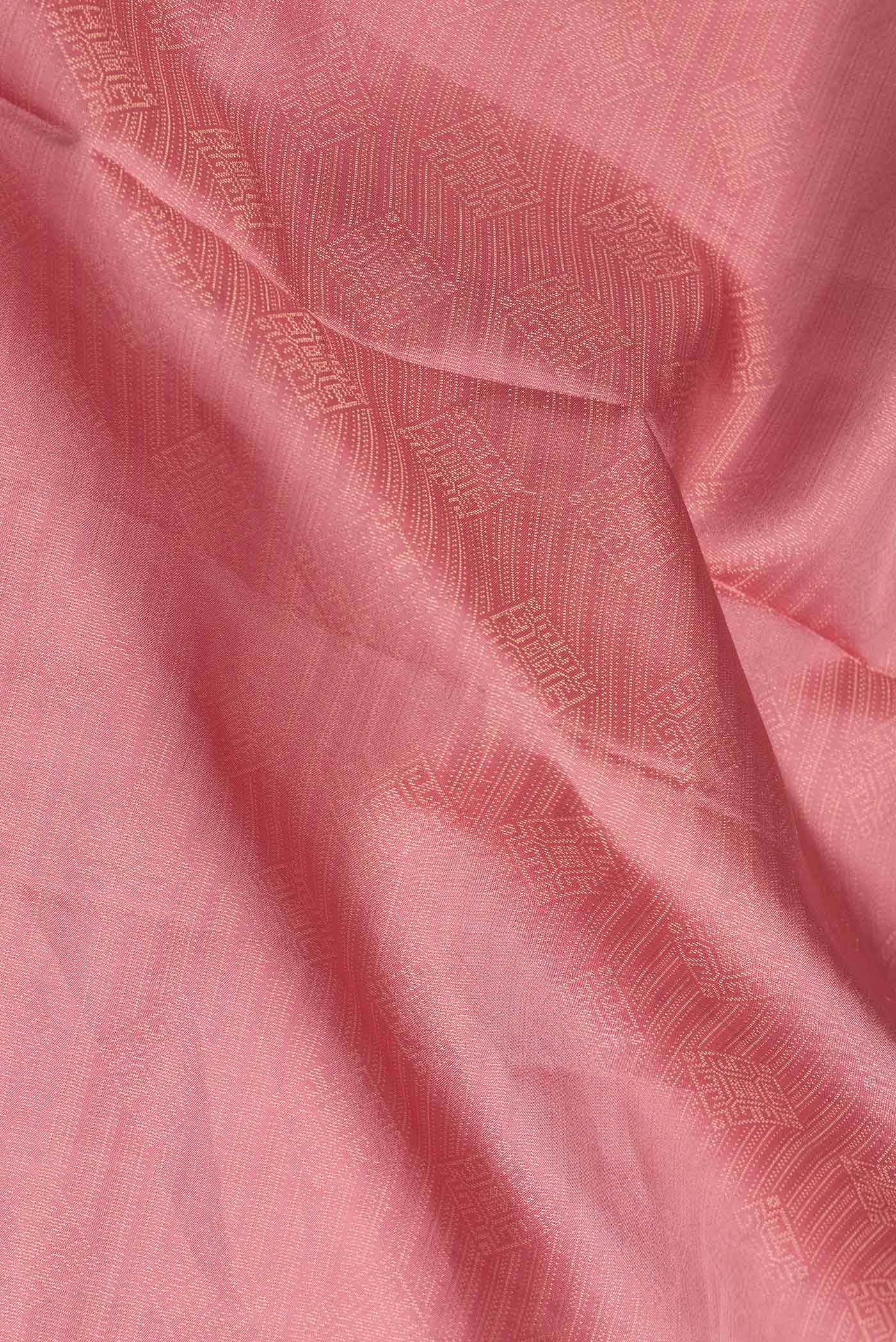 Close up of Pink Dual Tone Soft Silk Saree with Zari Brocade on the body and Zari Border.  displaying folds