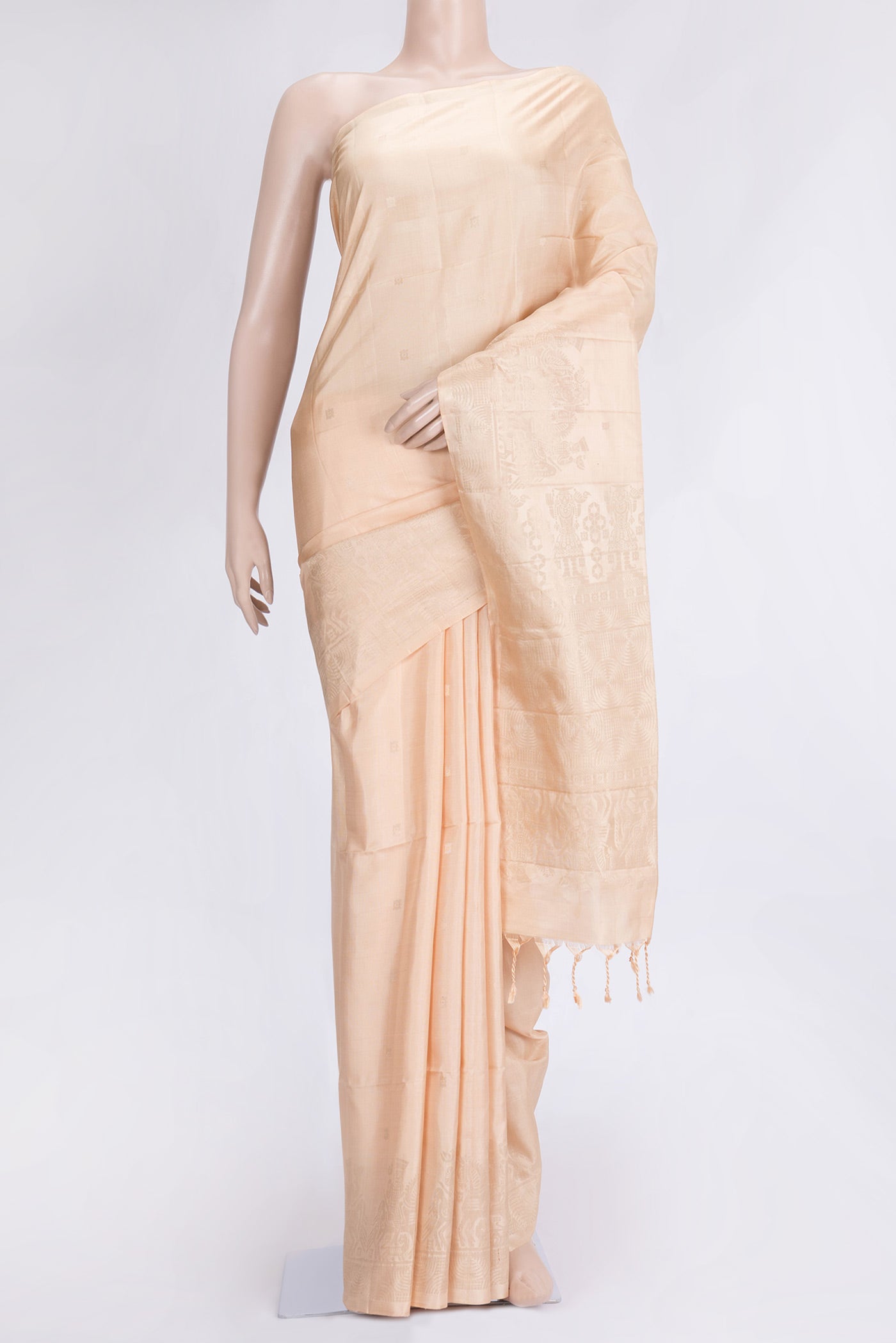 Beige Dual Tone Soft Silk Saree with Zari Butta on the body and Zari Border.  displayed on a mannequin