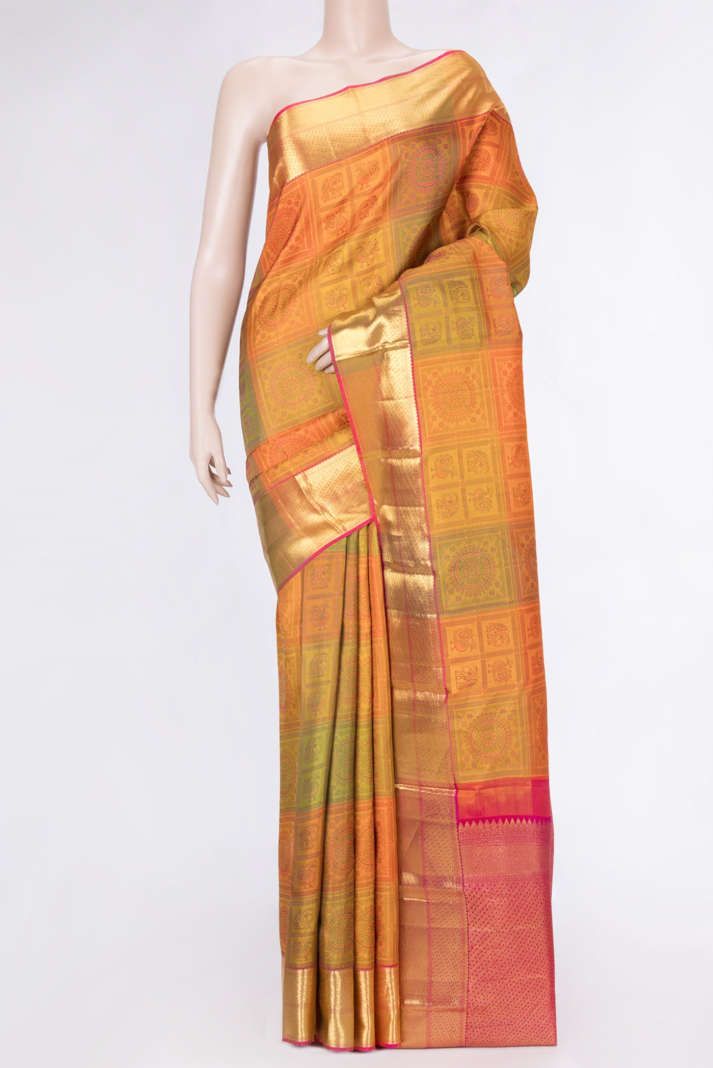 Mustard Dual Tone Kanjivaram Silk Saree with Jacquard design on the body and Zari Border.  displayed on a mannequin