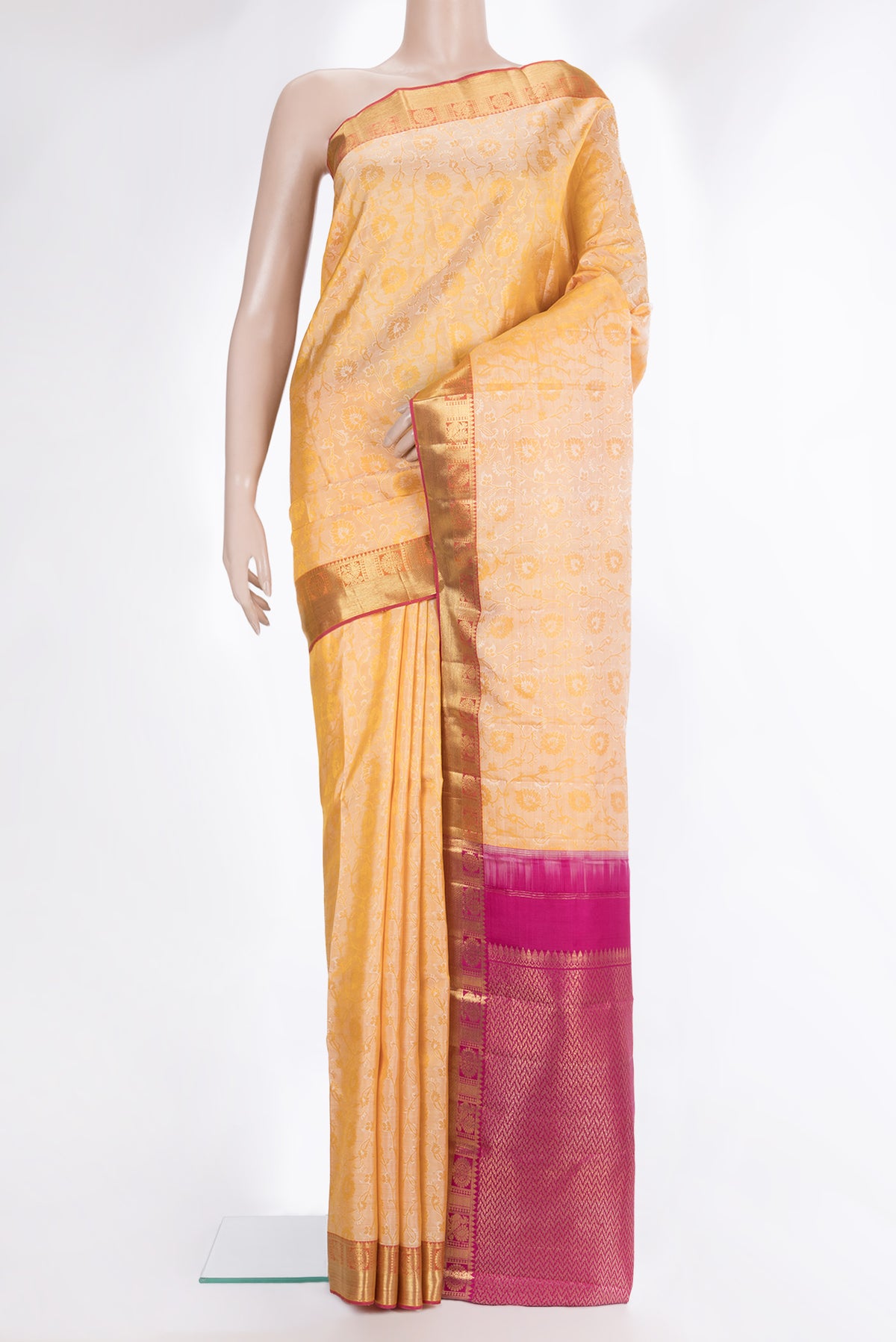 Pure Silk Sandal Kanjivaram Saree with Jacquard design on the body and Zari Border.  displayed on a mannequin