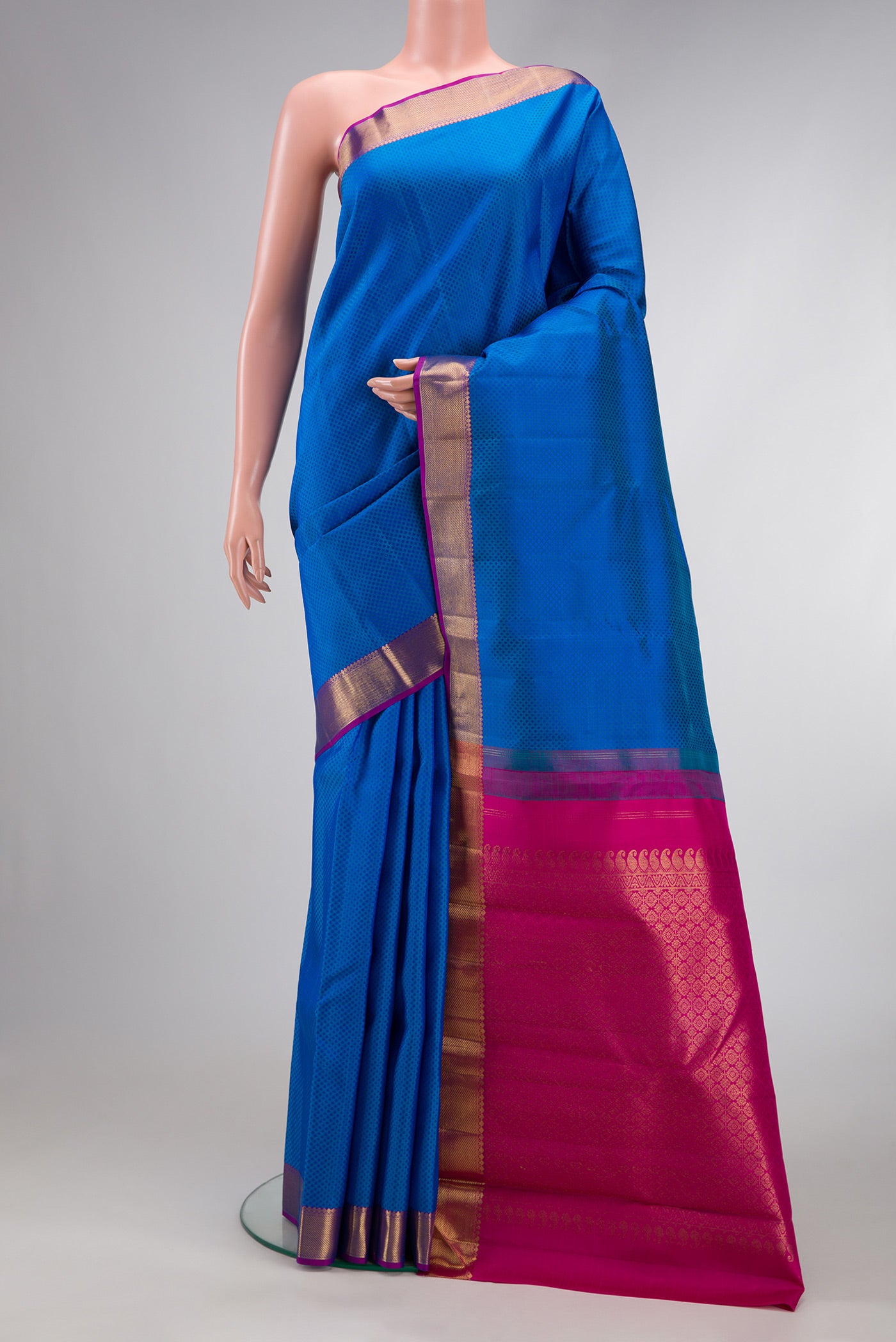 Royal Blue Dual Tone Kanjivaram Silk Saree with Jacquard design on the body and Zari Border.  displayed on a mannequin