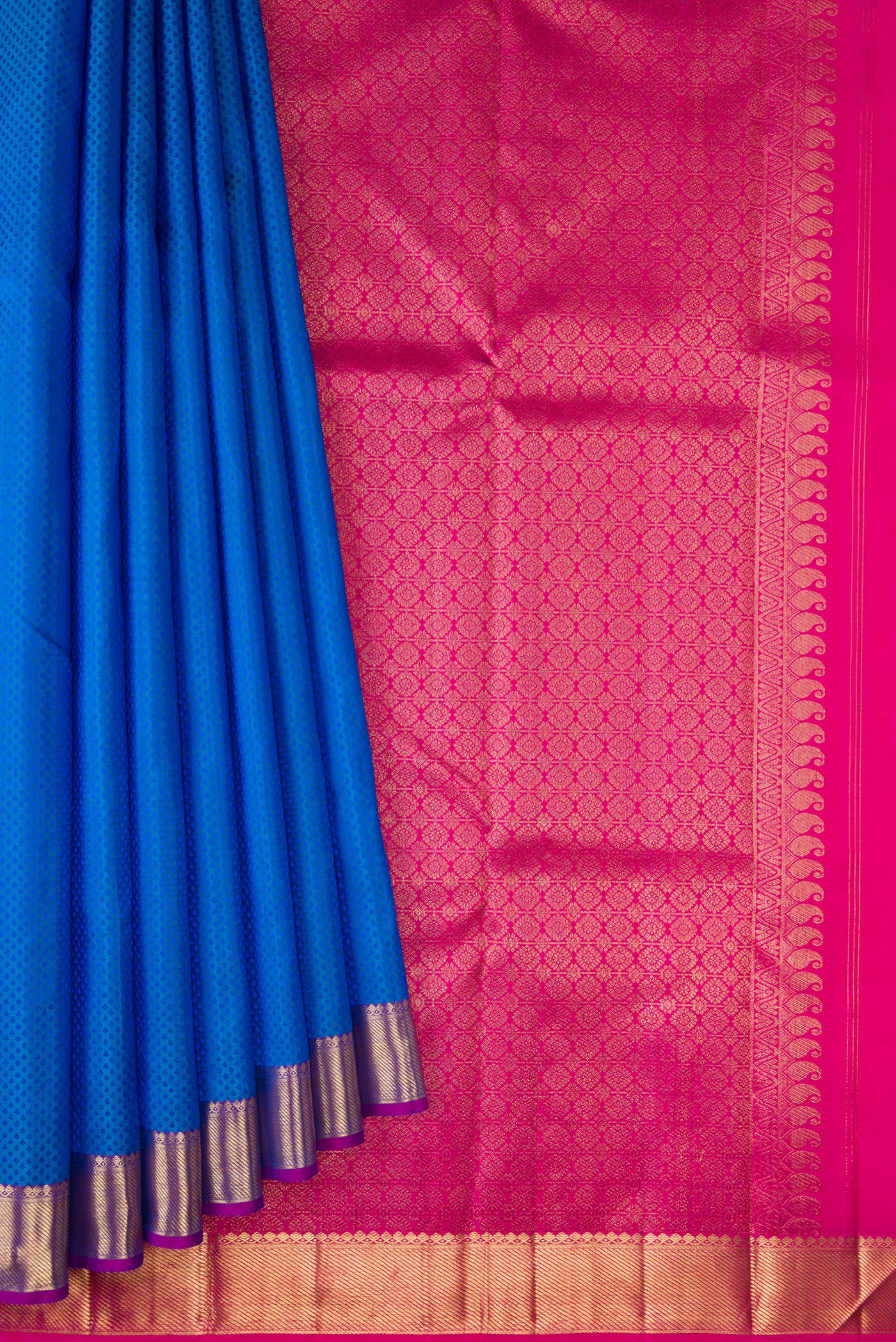 Pleats and pallu of Royal Blue Dual Tone Kanjivaram Silk Saree with Jacquard design on the body and Zari Border. 