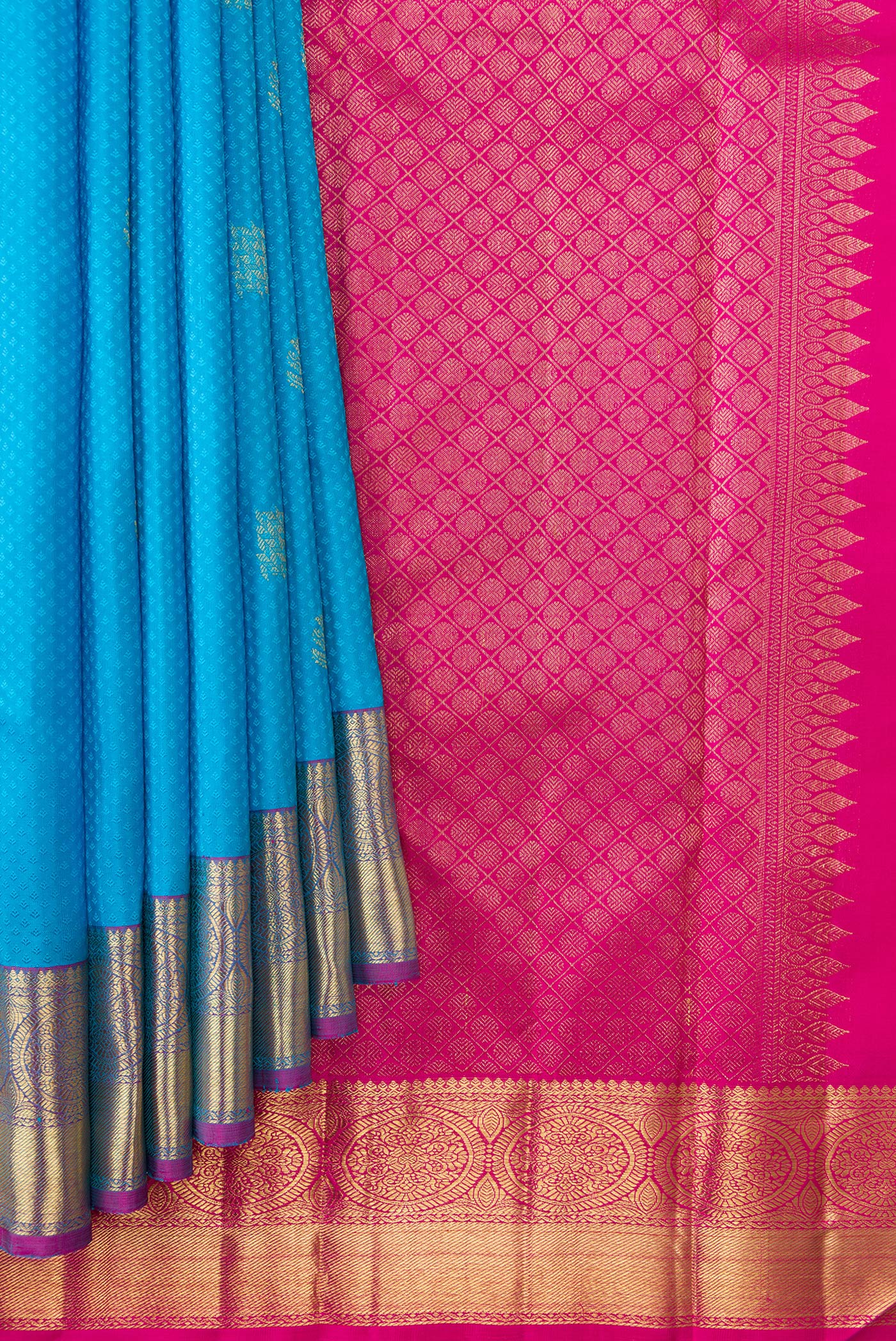 Pleats and pallu of Pure Silk Pure Zari Sky Blue Dual Tone Kanchipuram Saree with Jacquard With Zari Butta on the body and Zari Border. 