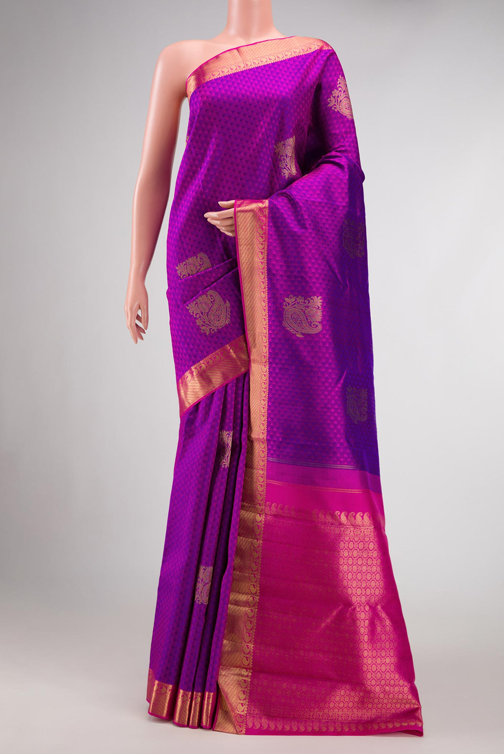 Pure Silk Pure Zari Purple Dual Tone Kanjivaram Saree with Jacquard With Zari Butta on the body and Zari Border.  displayed on a mannequin