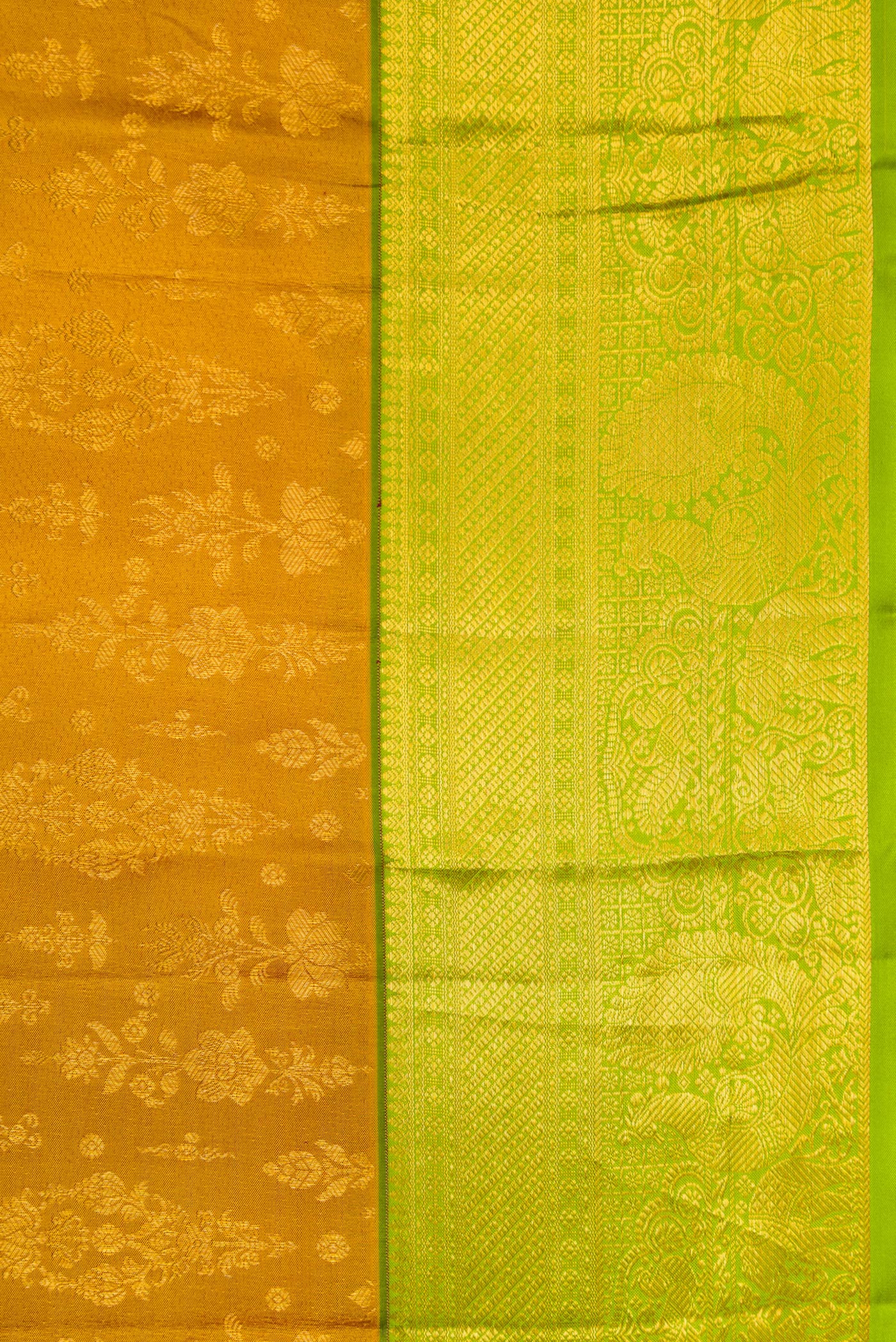 Border image of Gold Dual Tone Kanchipuram Silk Saree with Zari Brocade on the body and Zari Border. 