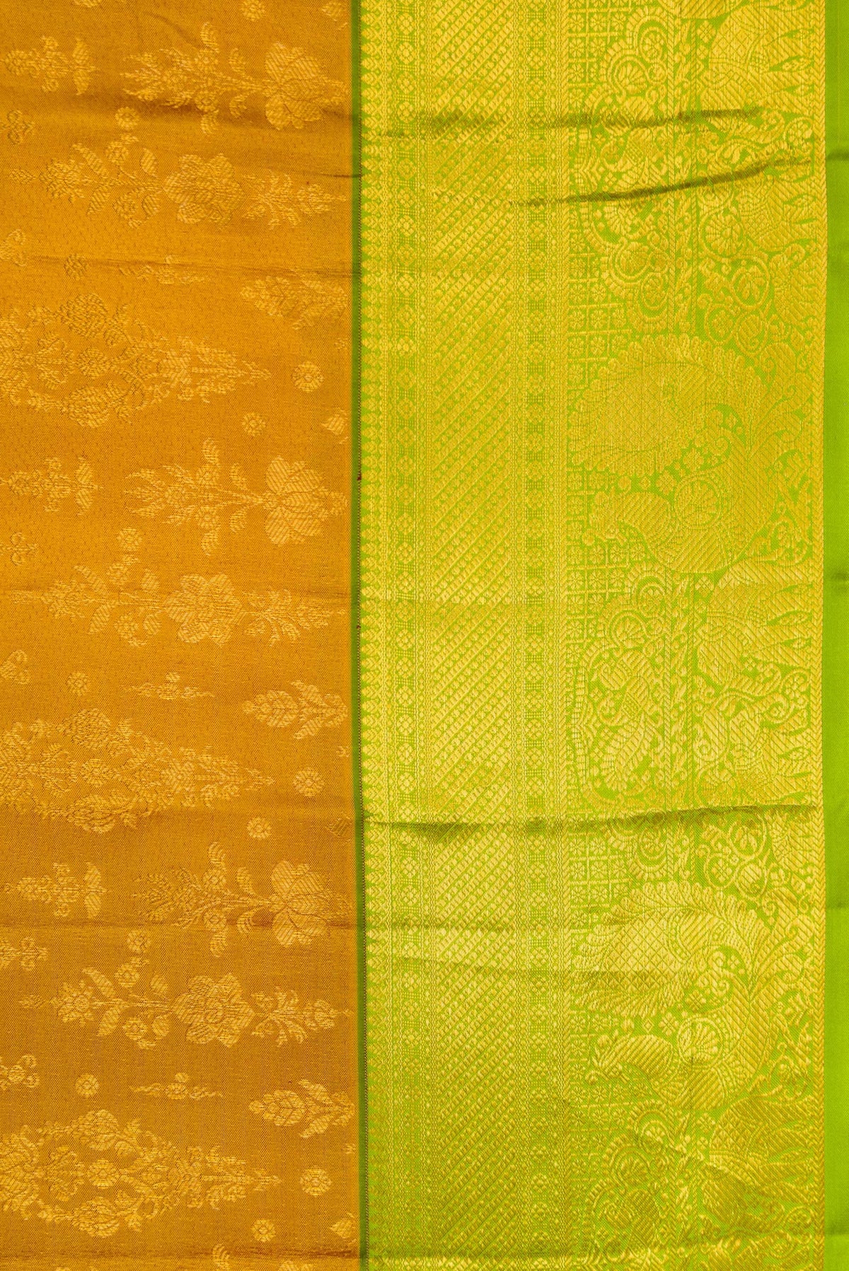 Border image of Gold Dual Tone Kanchipuram Silk Saree with Zari Brocade on the body and Zari Border. 