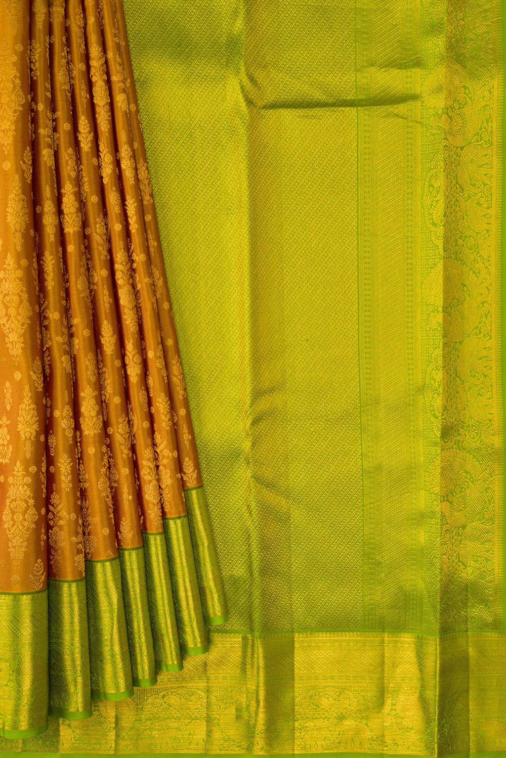 Pleats and pallu of Gold Dual Tone Kanchipuram Silk Saree with Zari Brocade on the body and Zari Border. 