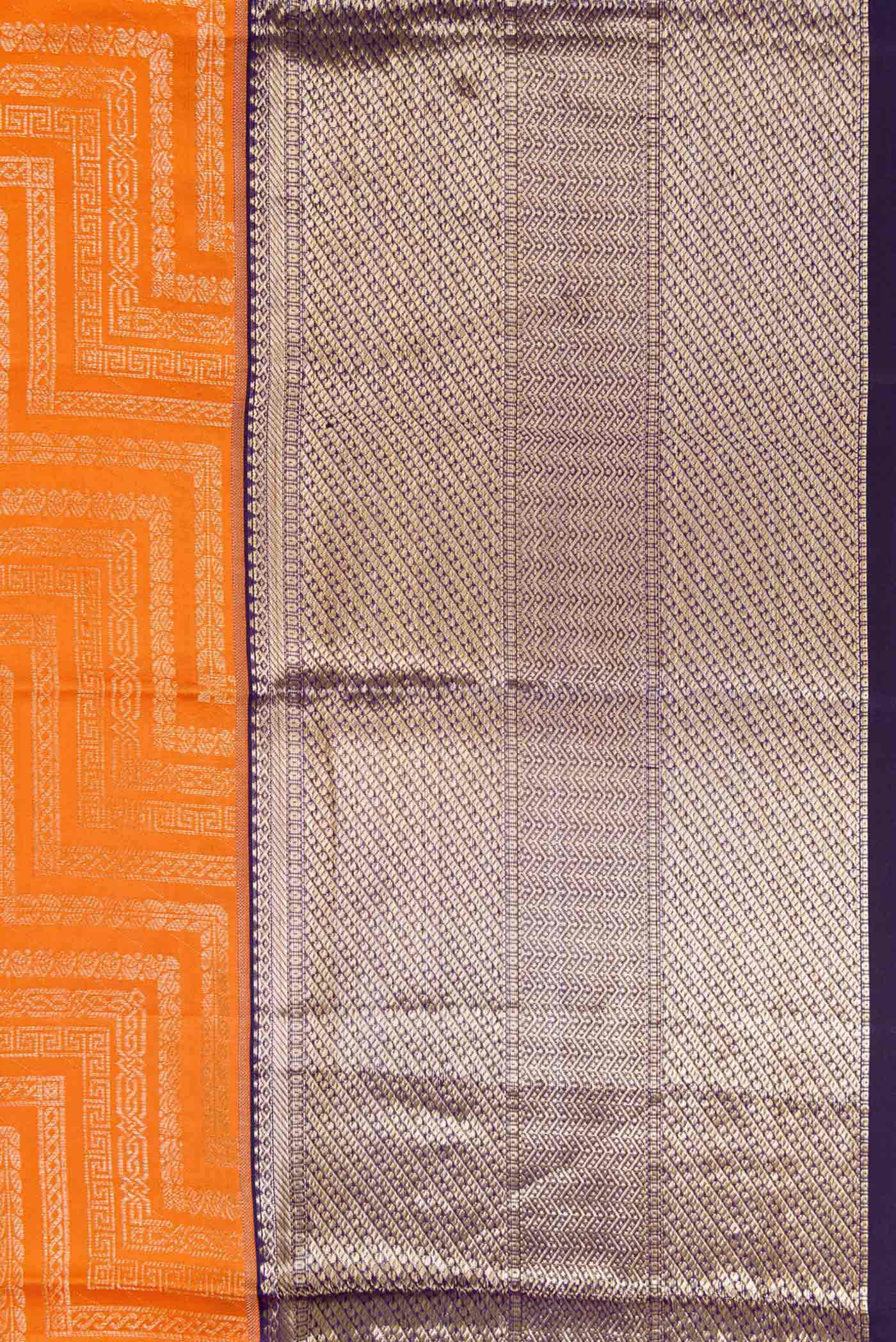 Border image of Orange Dual Tone Kanchipuram Silk Saree with Zari Brocade on the body and Zari Border. 