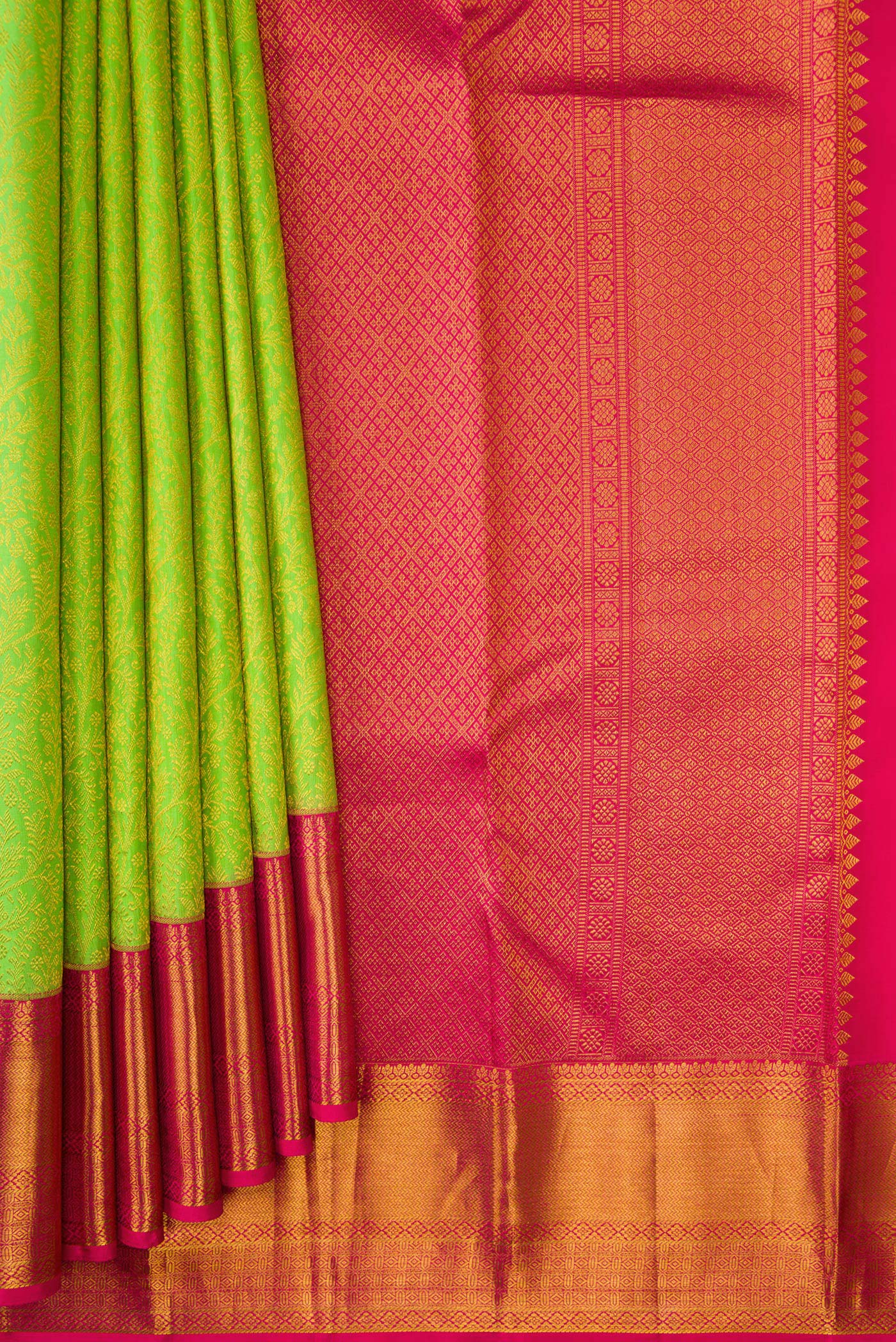 Pleats and pallu of Parrot Green Dual Tone Kanchipuram Silk Saree with Zari Brocade on the body and Zari Border. 