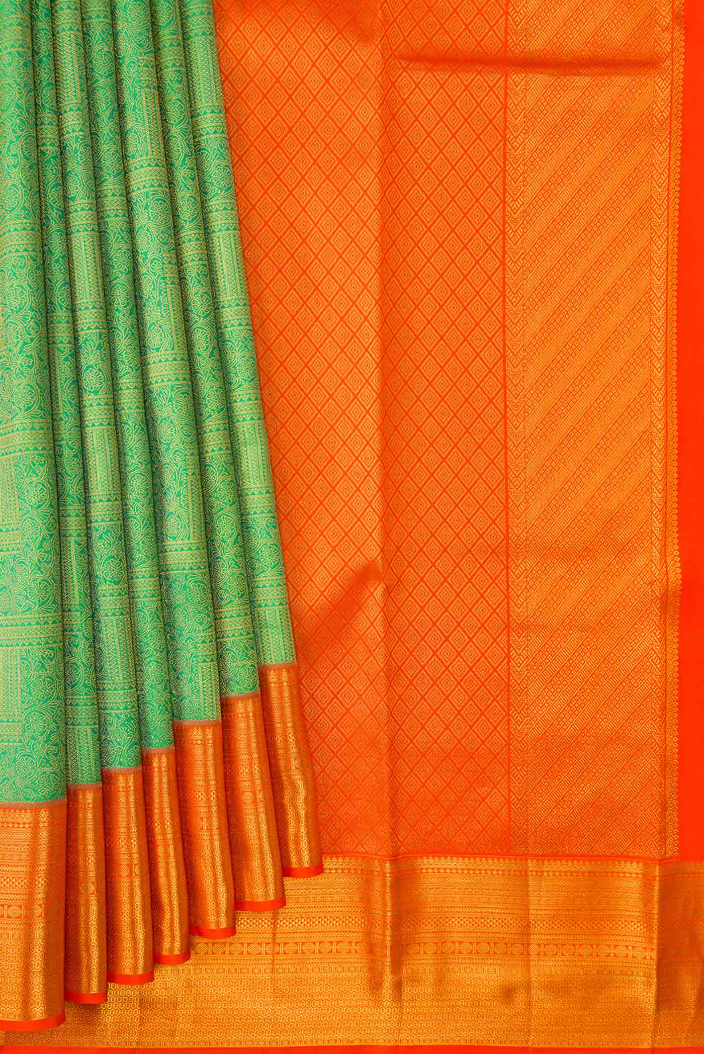 Pleats and pallu of Parrot Green Dual Tone Kanchipuram Silk Saree with Zari Brocade on the body and Zari Border. 