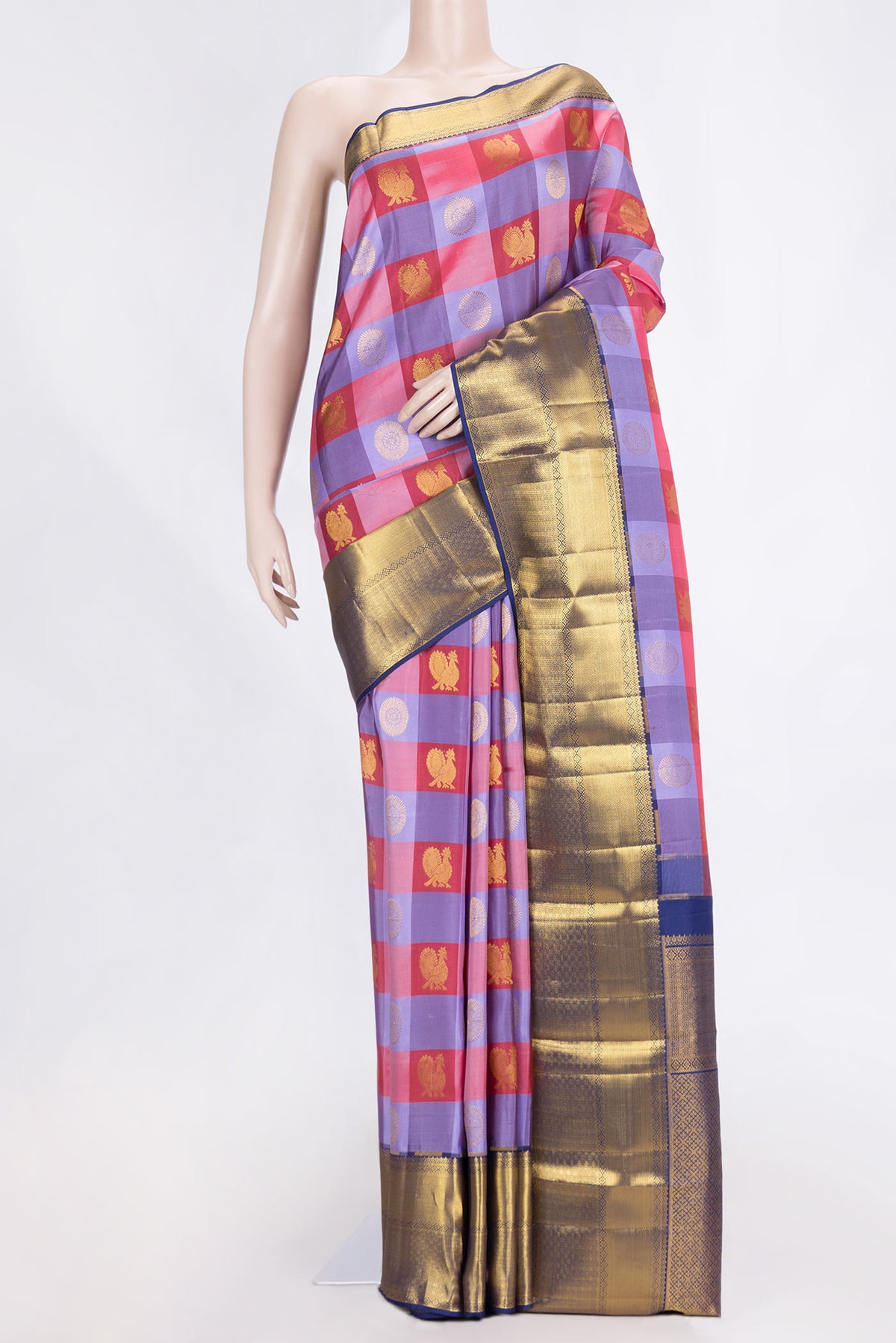 Lavender,Maroon and Pink Color Kanchipuram Saree with Checked design on the body and Zari Border.  displayed on a mannequin