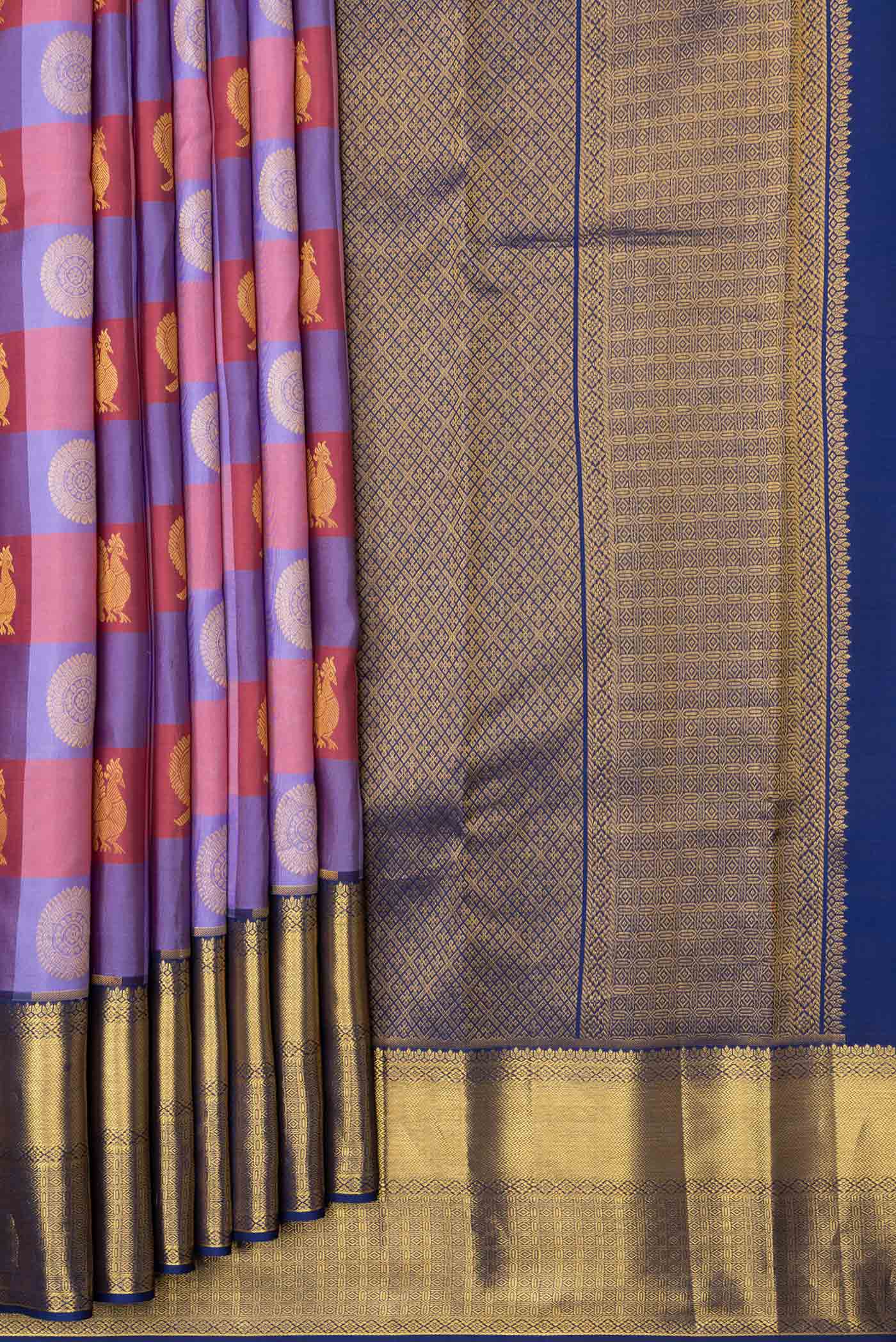 Pleats and pallu of Lavender,Maroon and Pink Color Kanchipuram Saree with Checked design on the body and Zari Border. 
