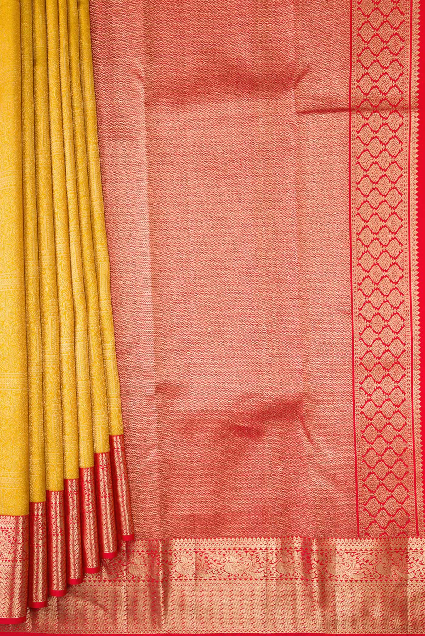 Pleats and pallu of Mustard Dual Tone Kanjivaram Silk Saree with Zari Brocade on the body and Zari Border. 