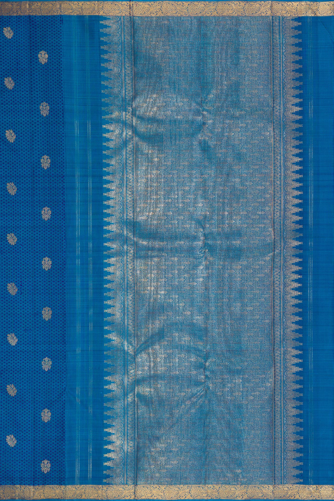 Close up image of the pallu of Peacock Blue Dual Tone Kanjivaram Silk Saree with Jacquard With Zari Butta on the body and Zari Border. 