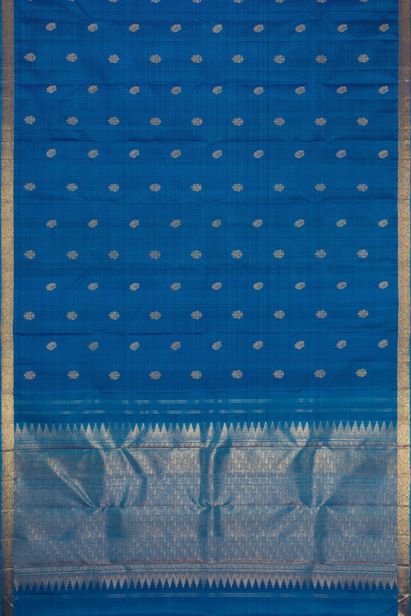 Flat view of Peacock Blue Dual Tone Kanjivaram Silk Saree with Jacquard With Zari Butta on the body and Zari Border. 