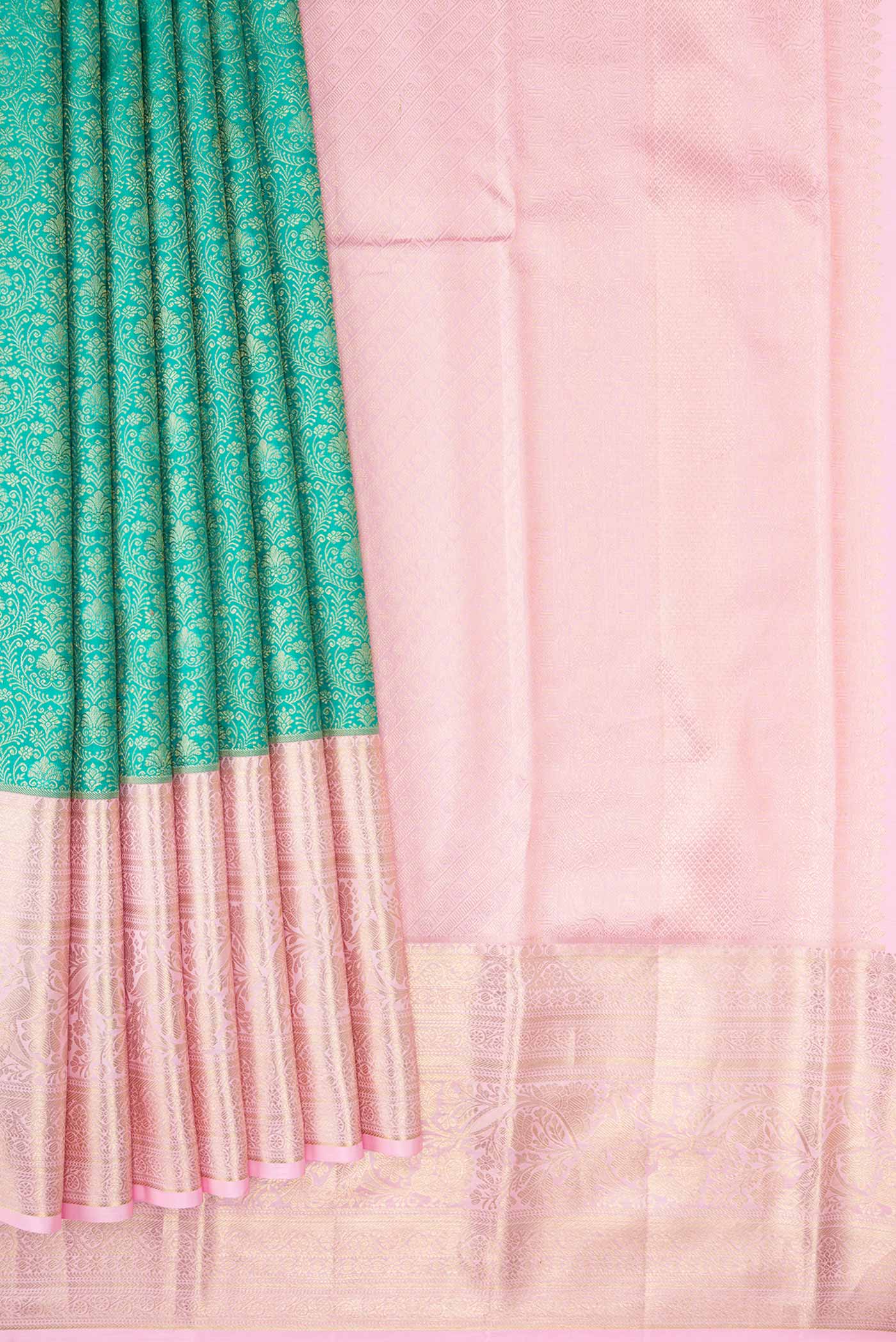Pleats and pallu of Green Dual Tone Kanjivaram Silk Saree with Zari Brocade on the body and Zari Border. 