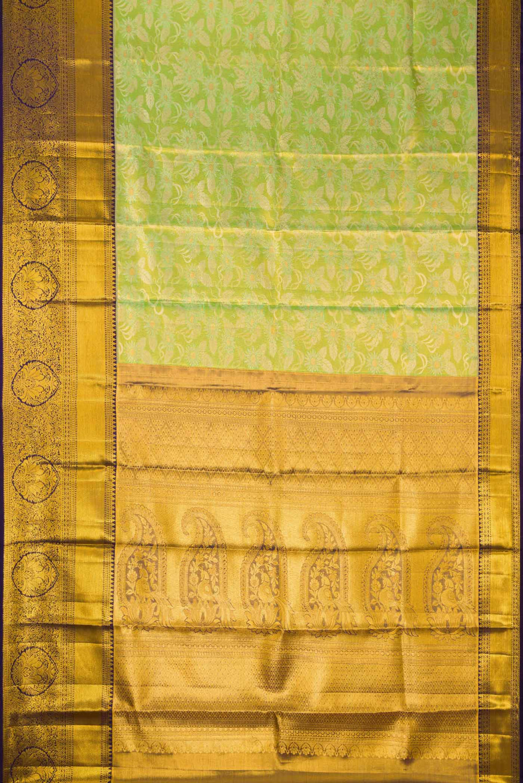 Flat view of Pista Green Dual Tone Kanchipuram Tissue Silk Saree with Zari Brocade on the body and Zari Border. 