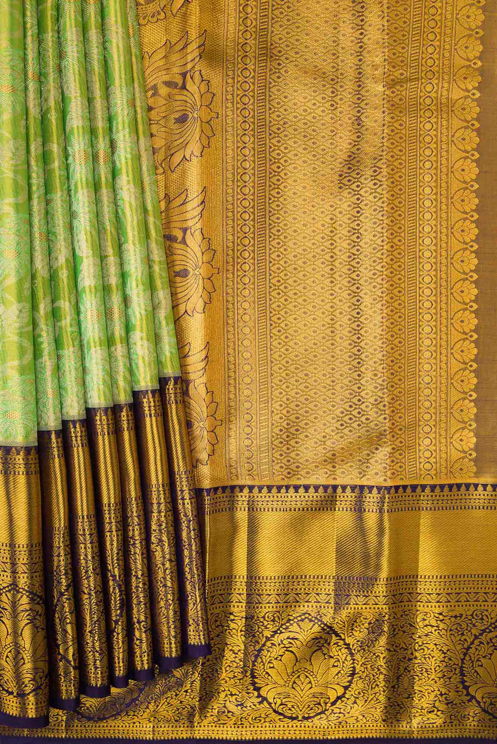 Pleats and pallu of Pista Green Dual Tone Kanchipuram Tissue Silk Saree with Zari Brocade on the body and Zari Border. 