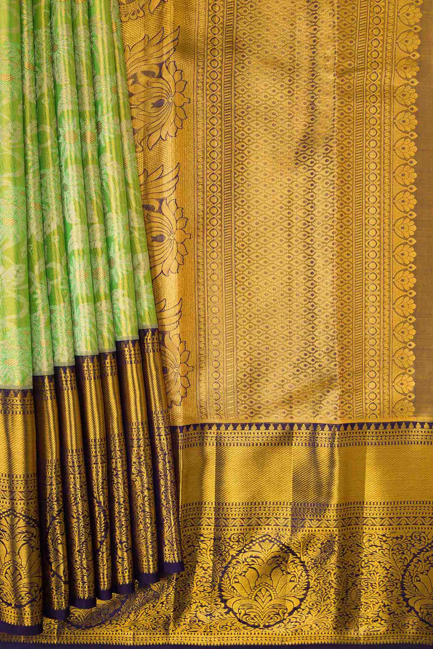 Pleats and pallu of Pista Green Dual Tone Kanchipuram Tissue Silk Saree with Zari Brocade on the body and Zari Border. 