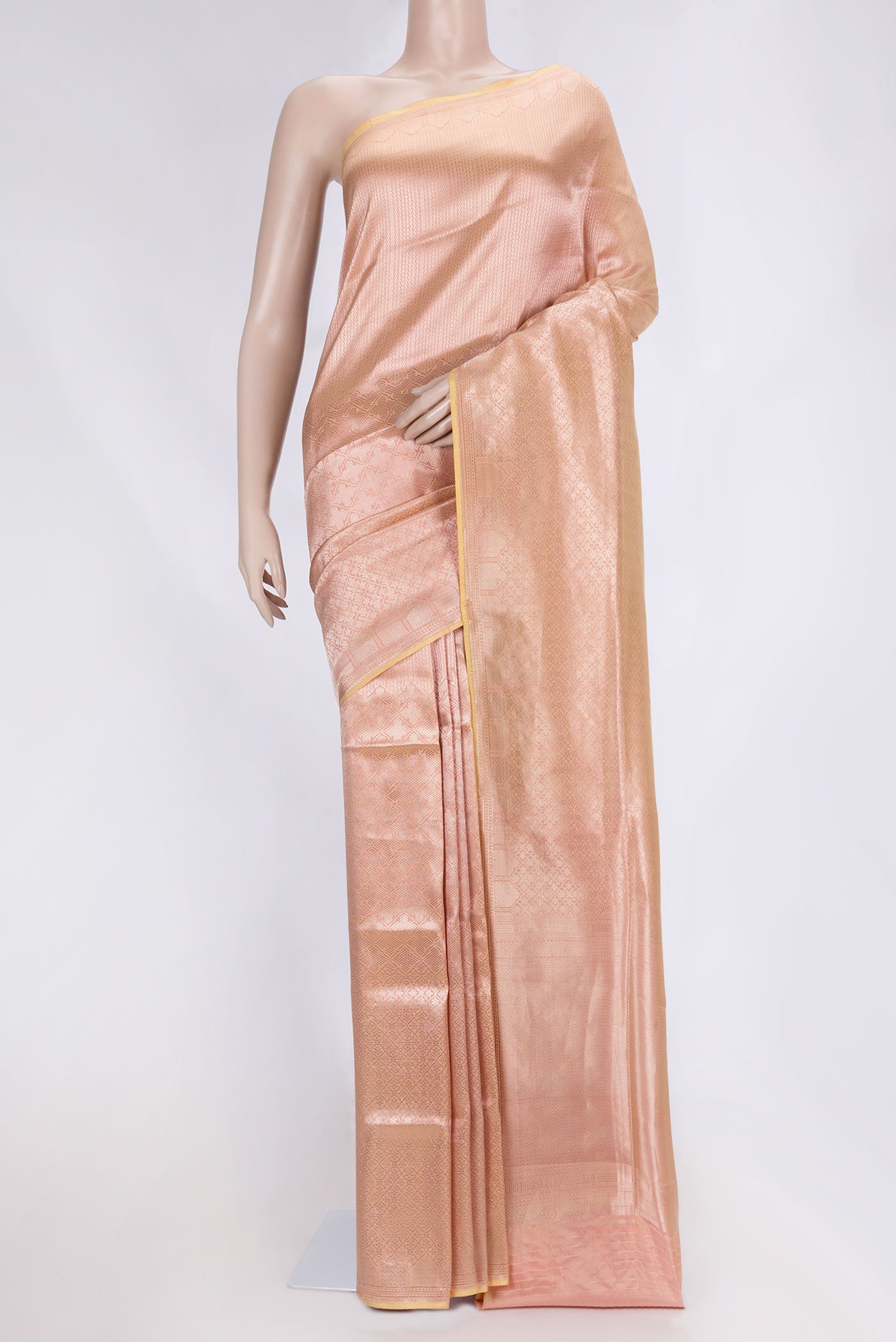 Peach Banarasi Silk Saree with Zari Brocade on the body and Zari Border displayed on a mannequin