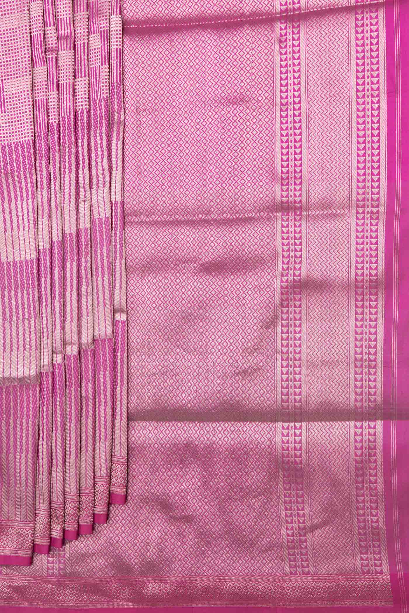 Pleats and pallu of Magenta Banarasi Silk Saree with Zari Brocade on the body and Zari Border