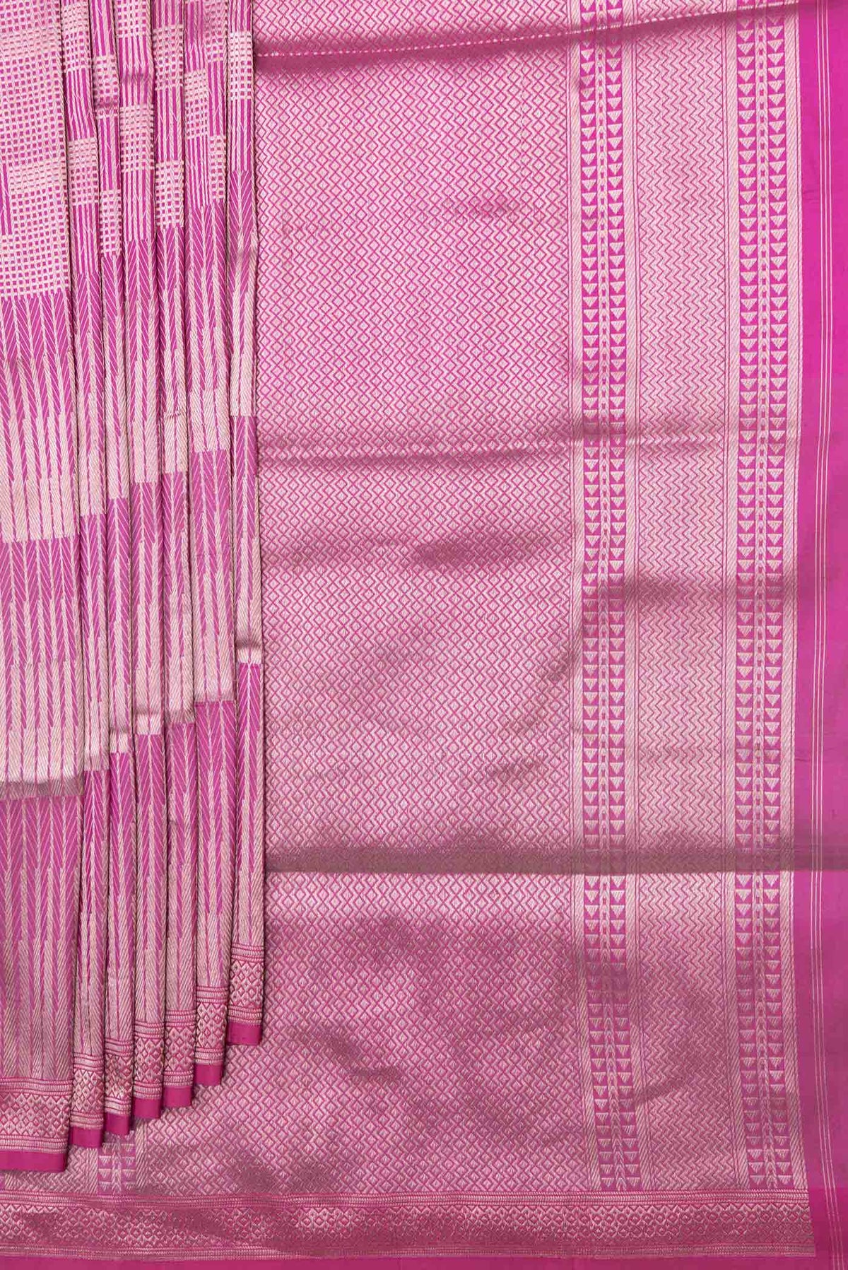 Pleats and pallu of Magenta Banarasi Silk Saree with Zari Brocade on the body and Zari Border