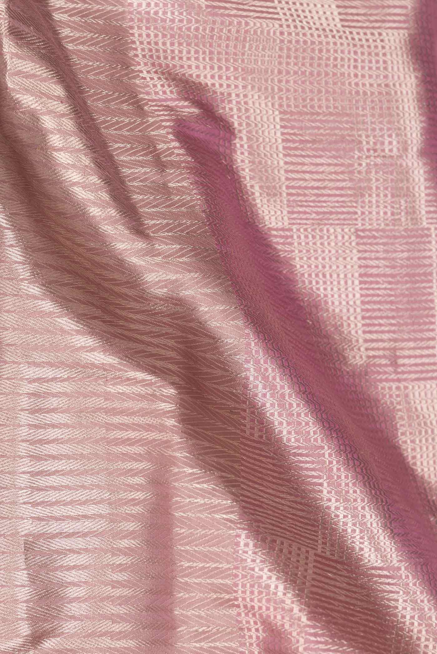 Close up of Pink Dual Tone Banarasi Silk Saree with Zari Brocade on the body and Zari Border displaying folds