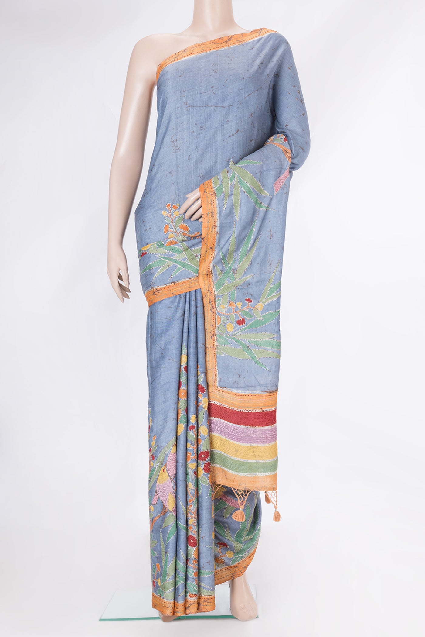Blue Tussar Silk Saree with Kantha Work on the body and Embroidery Border.  displayed on a mannequin