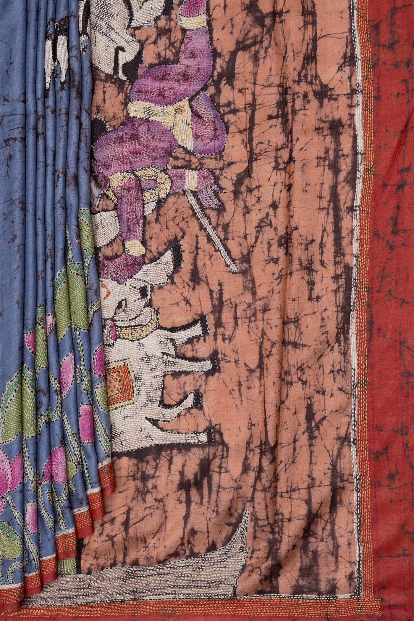 Pleats and pallu of Lilac Tussar Silk Saree with Embroidery on the body and Embroidery Border. 
