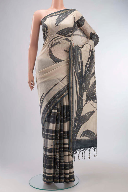 Beige Bhagalpuri Tussar Silk Saree with Embroidery on the body and Zari Border displayed on a mannequin