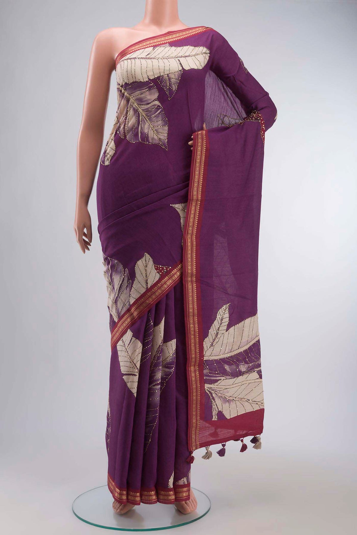 Magenta Bhagalpuri Tussar Silk Saree with Embroidery on the body and Plain Border displayed on a mannequin