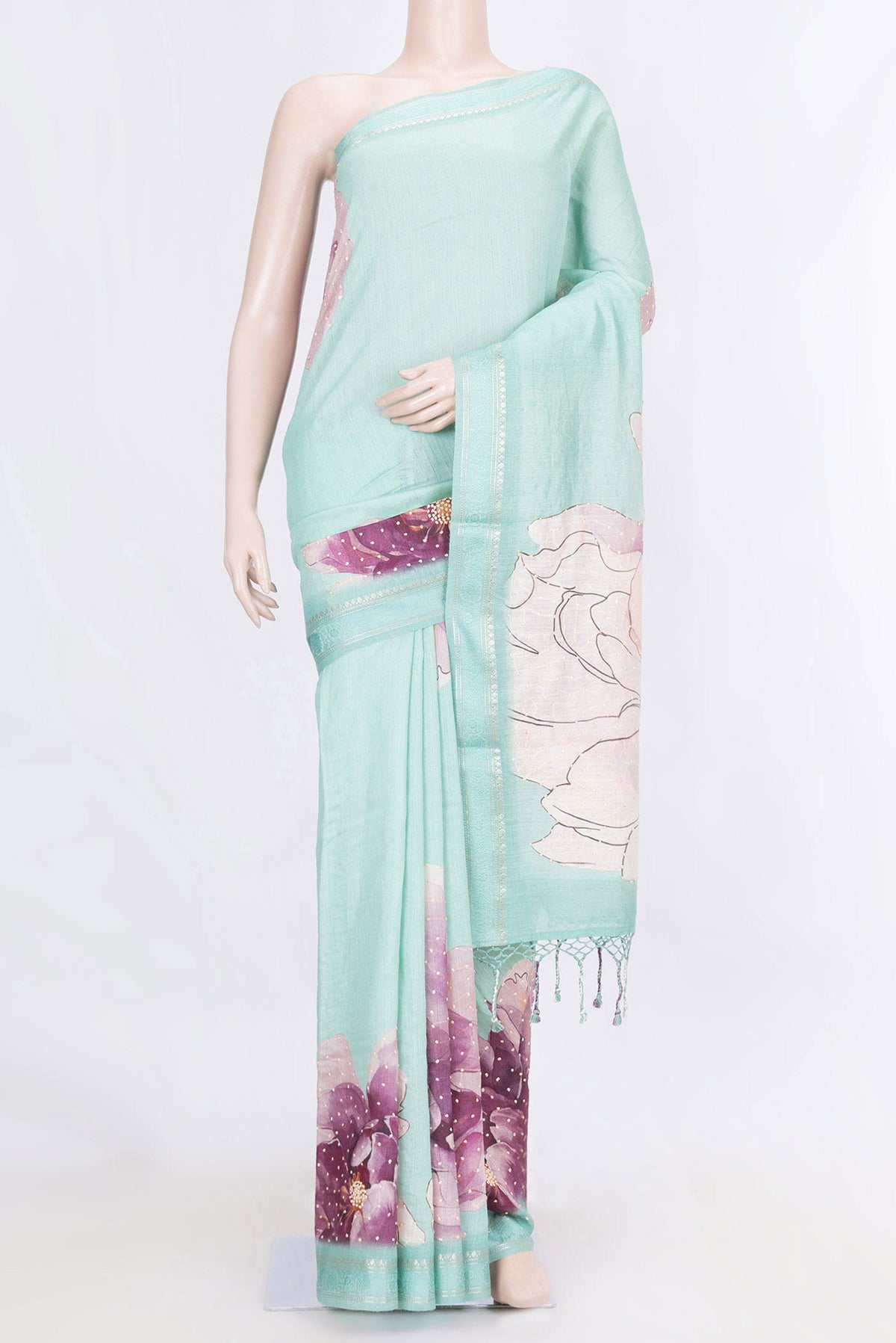 Light Blue Dual Tone Tussar Silk Saree with Embroidery on the body and Zari And Thread Border displayed on a mannequin