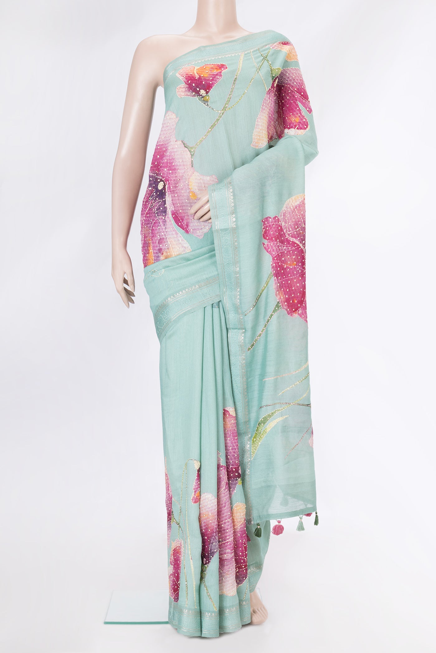 Sea Green Dual Tone Tussar Silk Saree with Embroidery on the body and Zari Border.  displayed on a mannequin