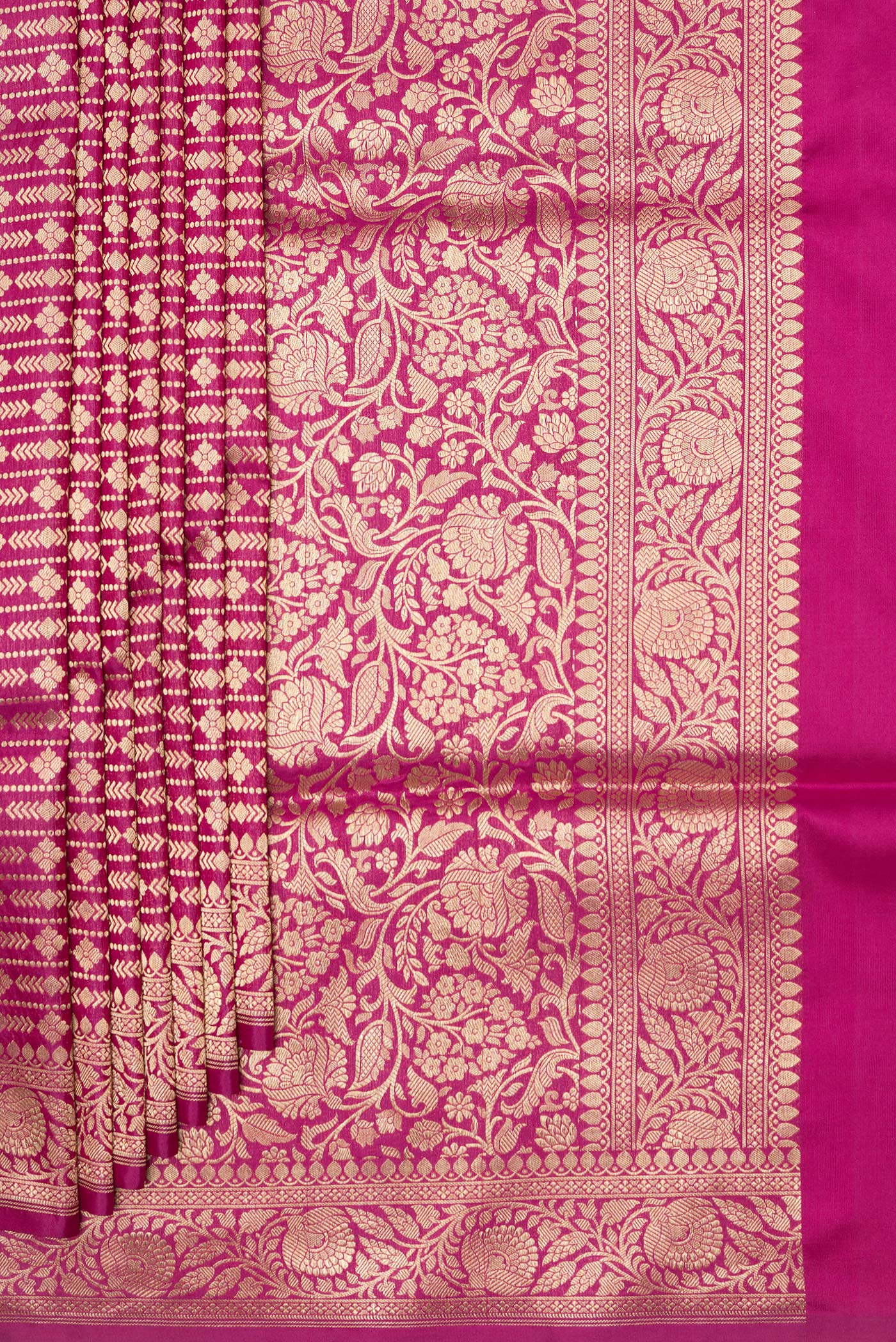Pleats and pallu of Magenta Banarasi Silk Saree with Zari Brocade on the body and Zari Border. 